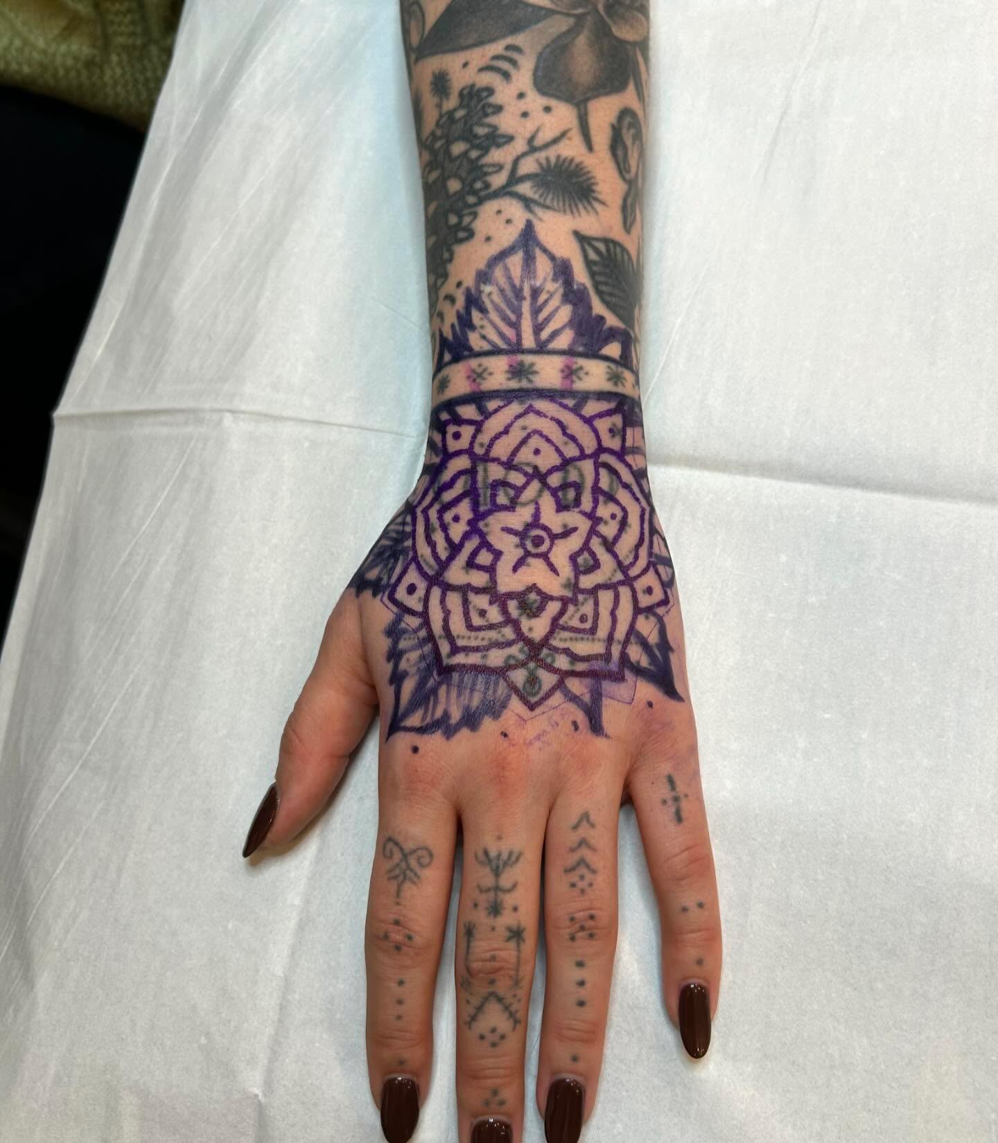 Mandala geometric tattoo on the hand by Sam Perry, Denver, Colorado