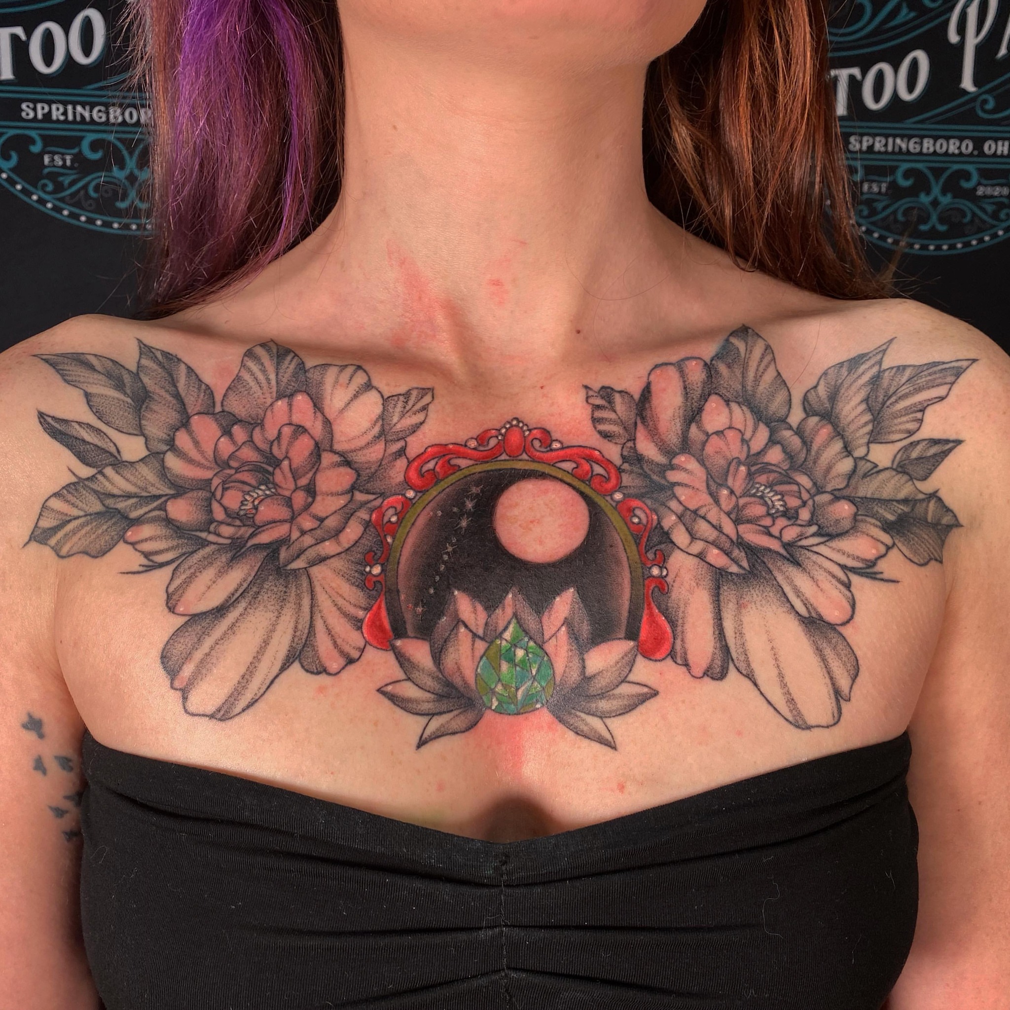 Moon and flowers American traditional tattoo on the chest by Maddie Neibert