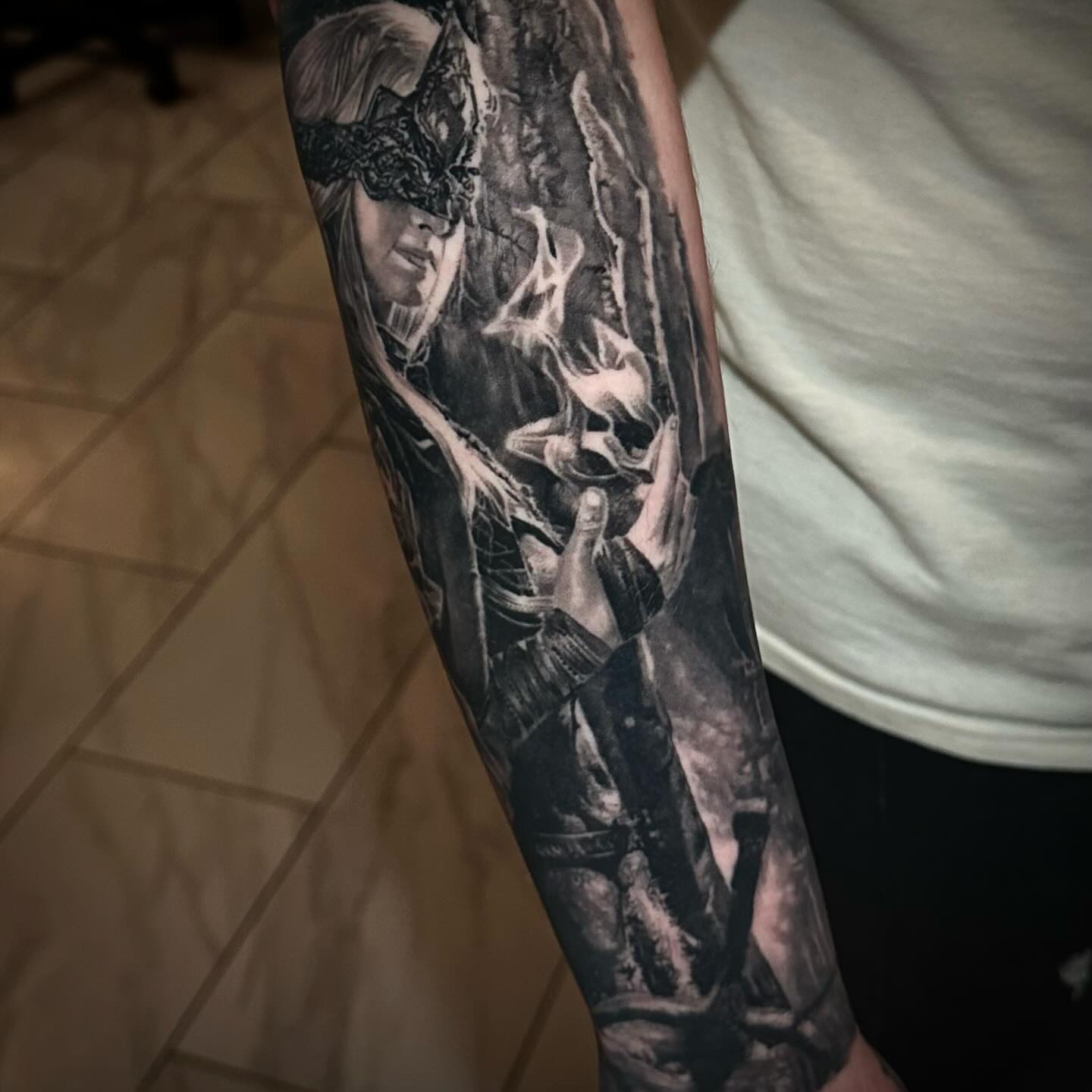 Woman with mask realism tattoo on the forearm by Chrisjansentattoo