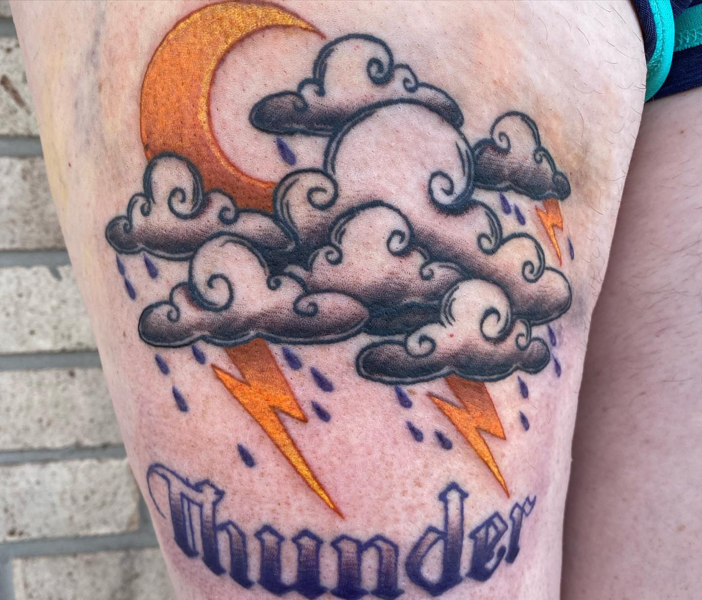 Thunder American traditional tattoo on the thigh by Savanna Starr Mortensen