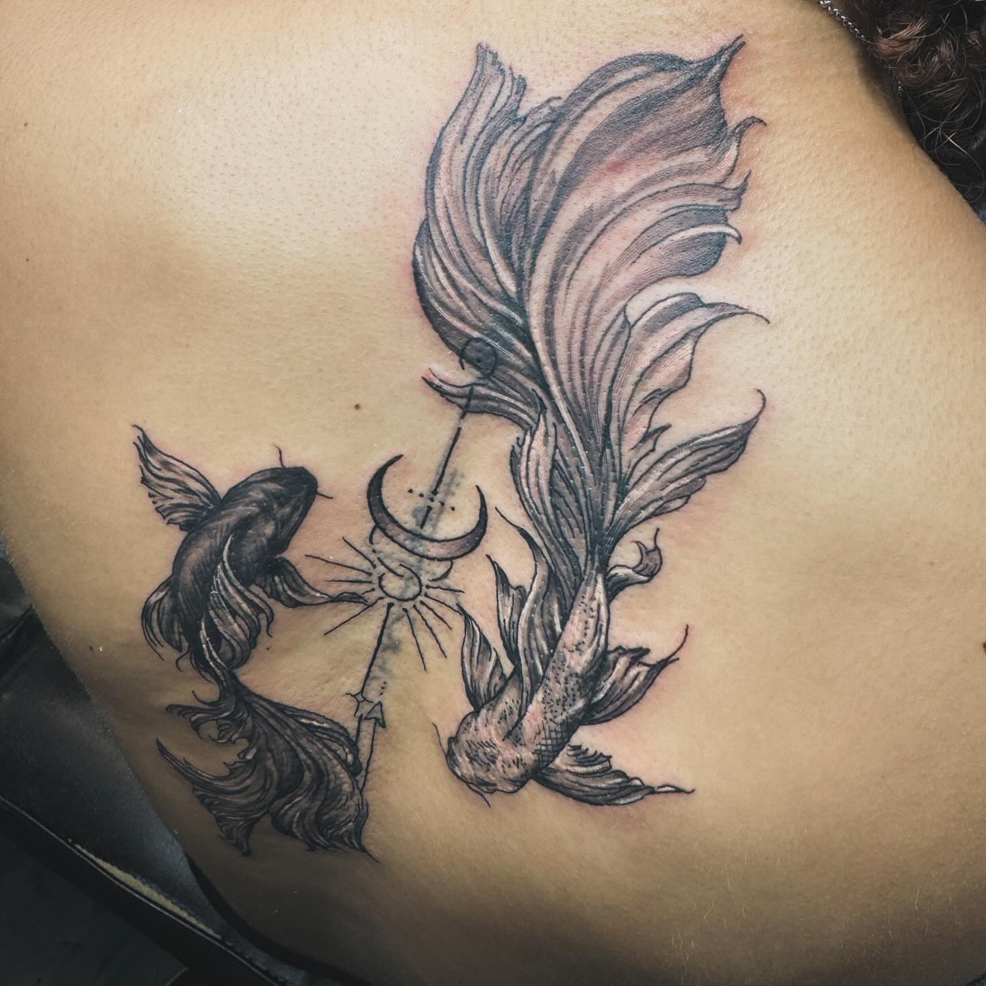 Goldfish and crescent moon black and grey tattoo on the shoulder by Anthony Pichardo 🦇