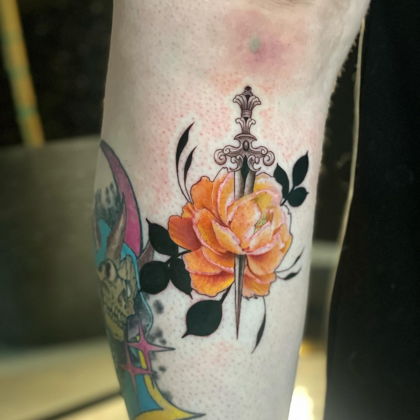 Rose and dagger American traditional tattoo on the forearm by Tori Bent