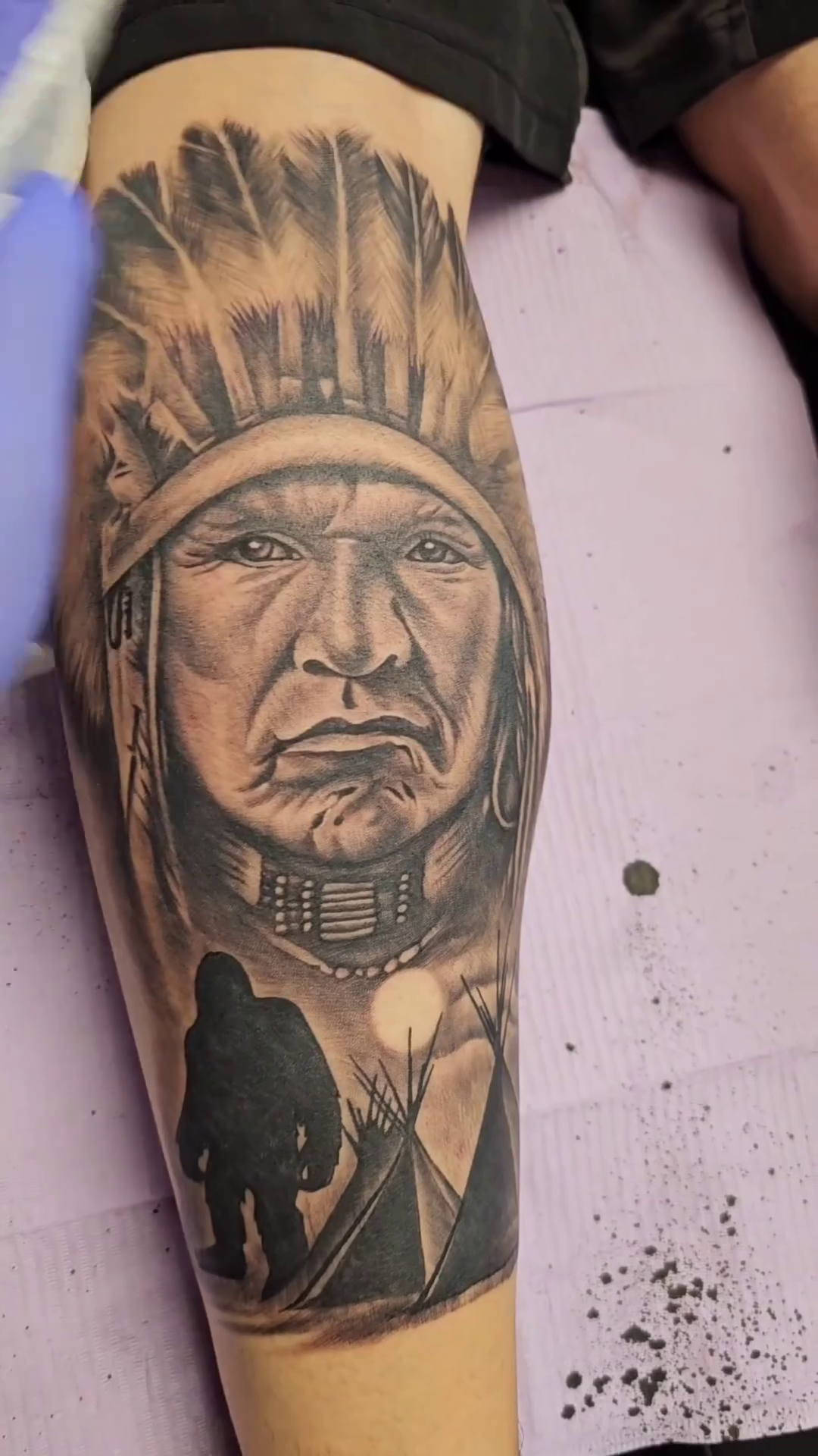 Native American chief with Bigfoot surrealism tattoo on the forearm by Mac Obaob