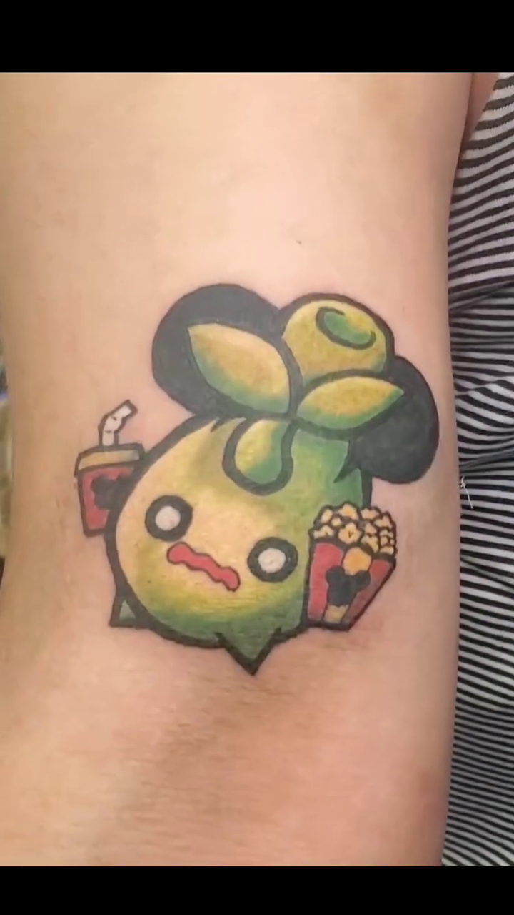 Smoliv with popcorn and soda anime tattoo by Chaz Escobar