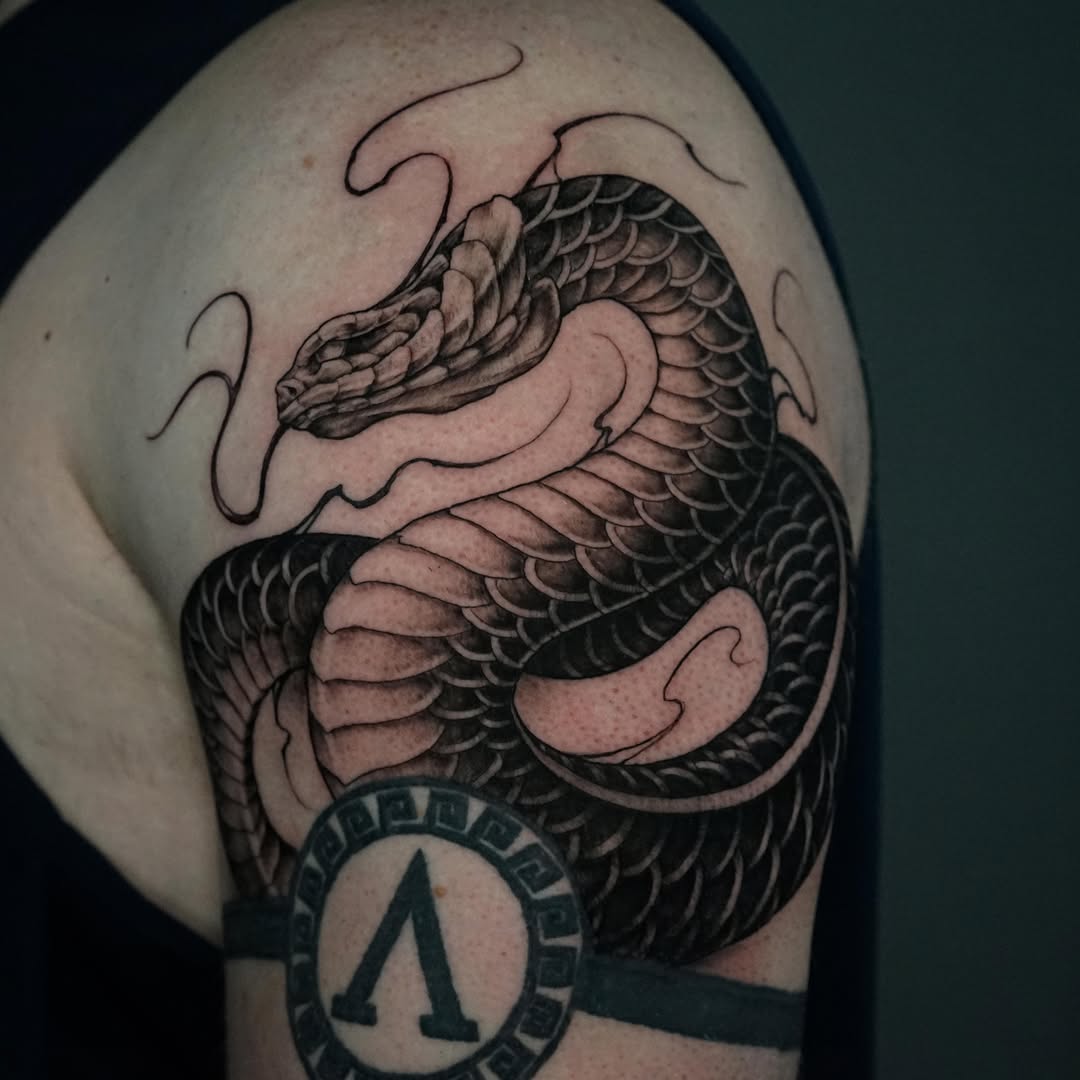 Tattoo by @dan_logan_tattoo — black_and_grey