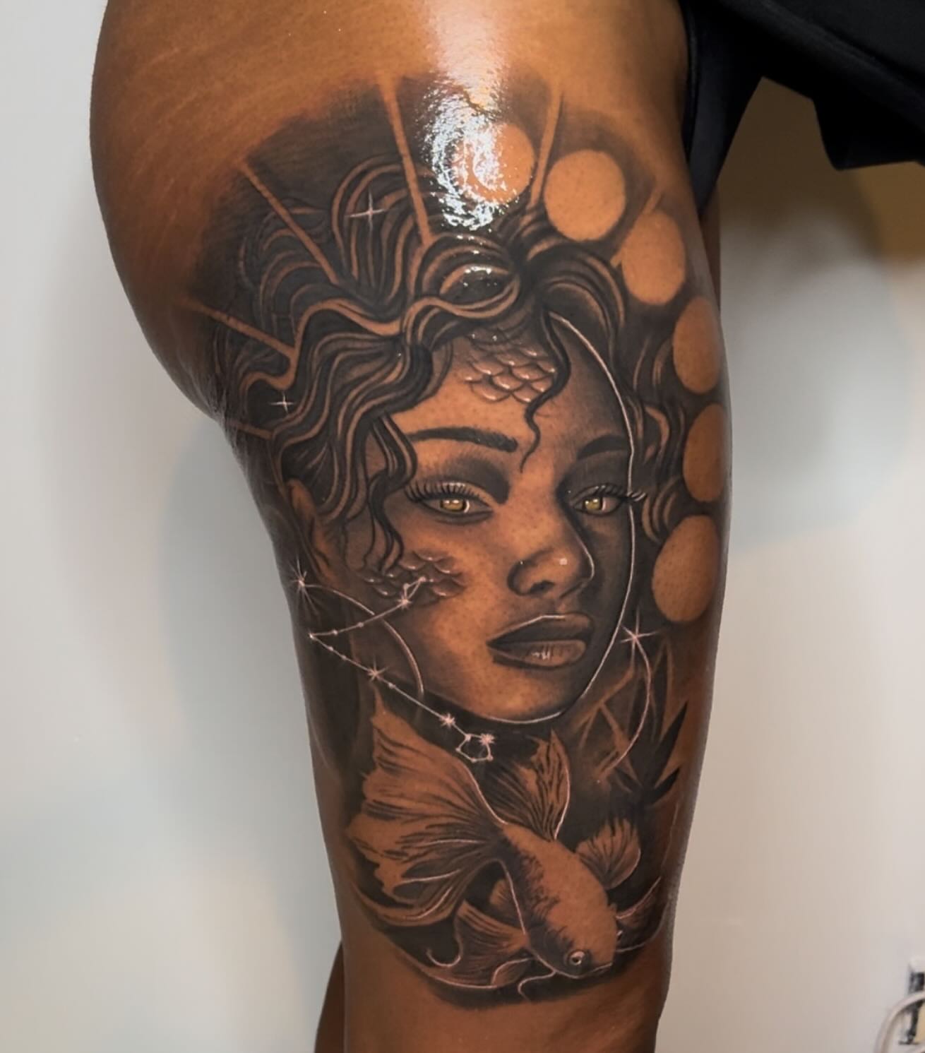 Woman's face realism tattoo on the thigh by Luis Meneses