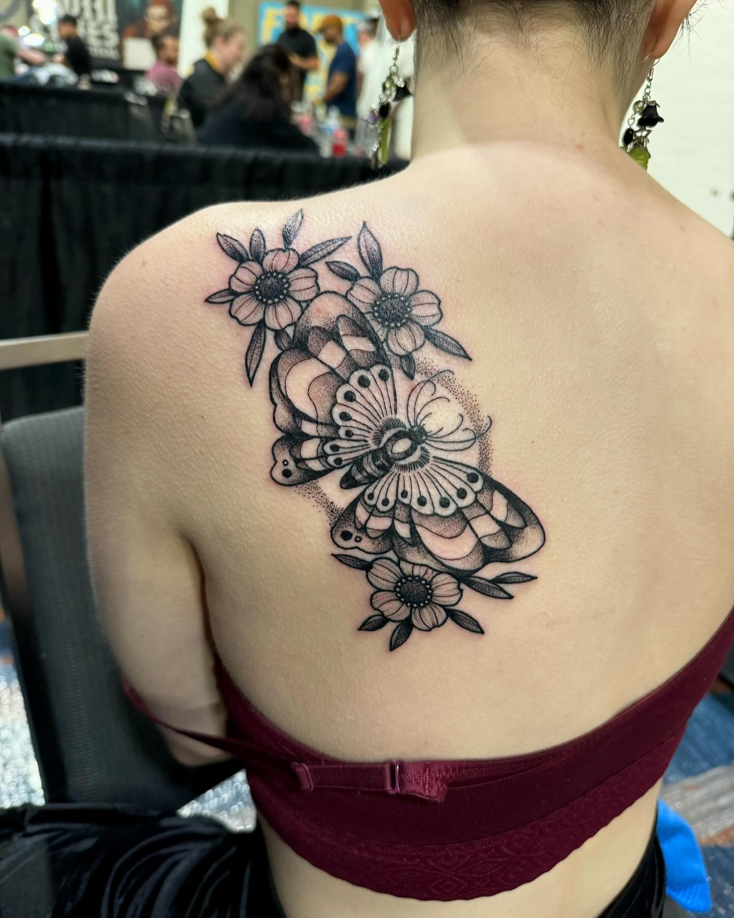 Floral arrangement dotwork tattoo on the back by Cj Hurtado