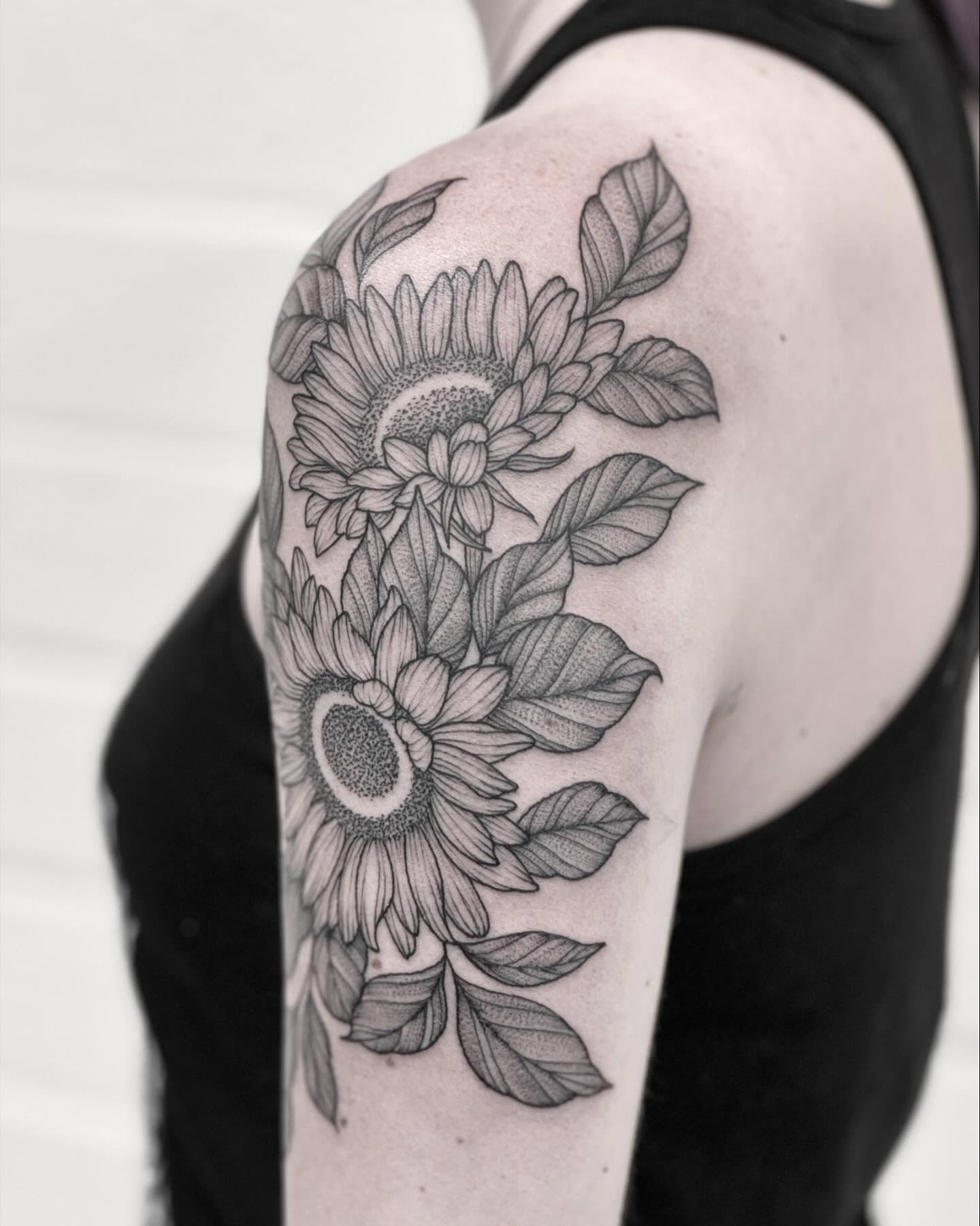 Sunflowers dotwork tattoo on the shoulder by Alex Shakuto Tattoo