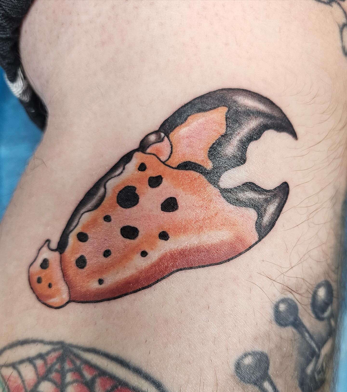 Pizza slice American traditional tattoo on the back by J. Arturo Laparra