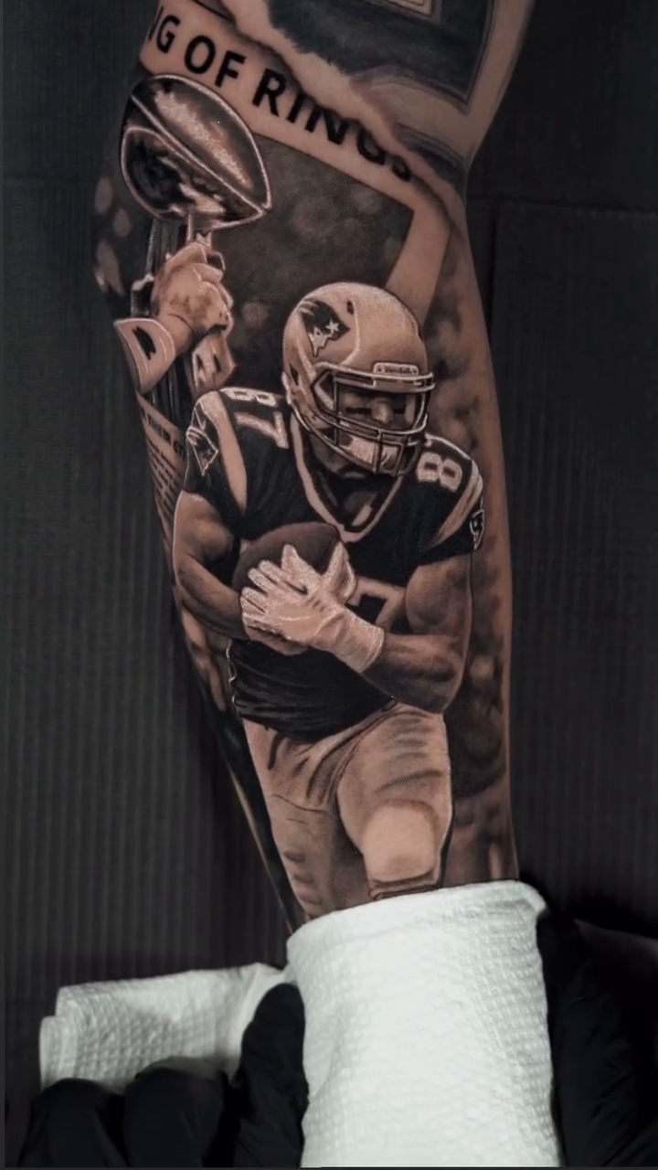 American football player with trophy realism tattoo by Jesus Alonso