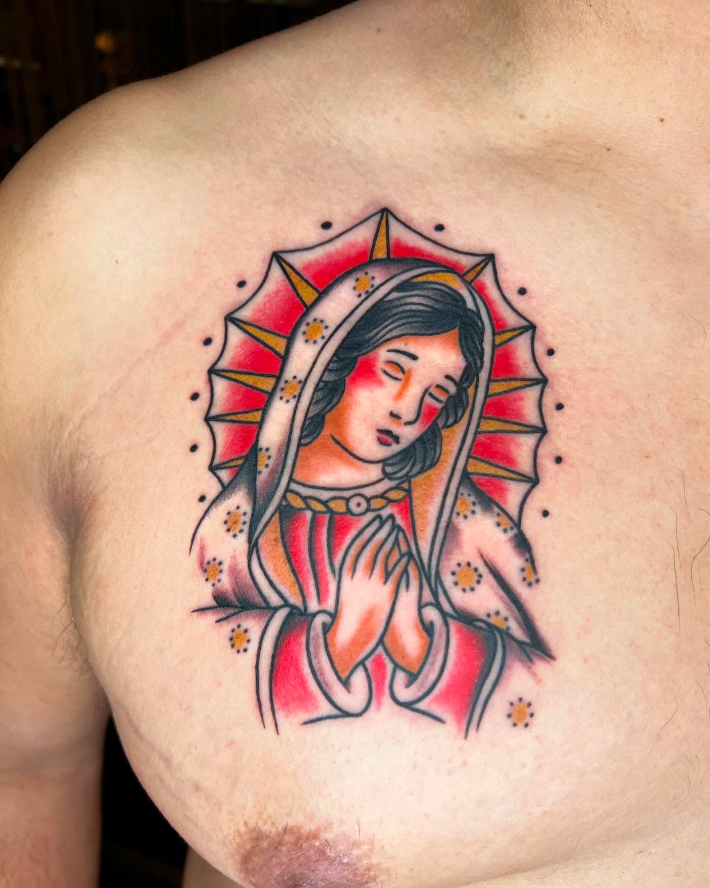 Religious figure American traditional tattoo on the chest by Cory Miller