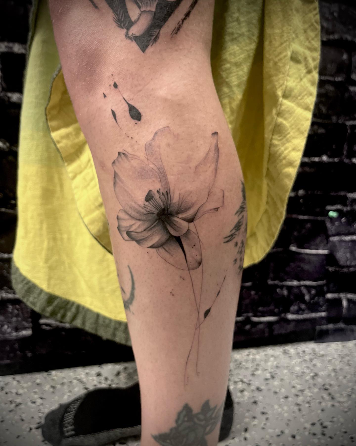 Flower black and grey tattoo on the forearm by oh hey, robin.