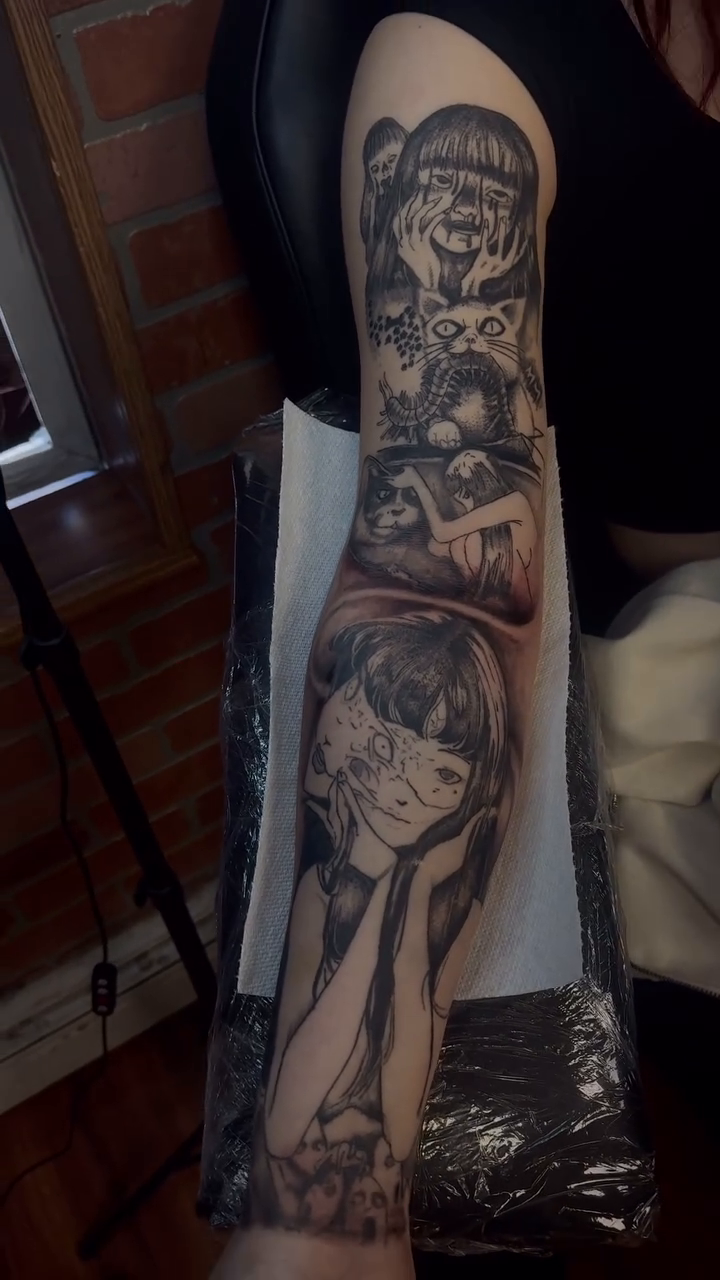 Girl with doll and clown realism tattoo by Marvin Osorno