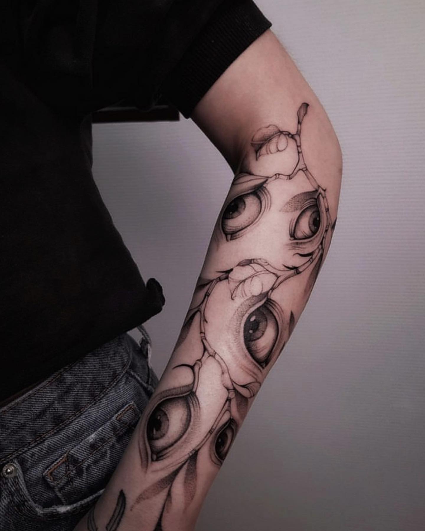 Eyes realism tattoo on the forearm by Tattoo Seattle Anime Japanese San Francisco