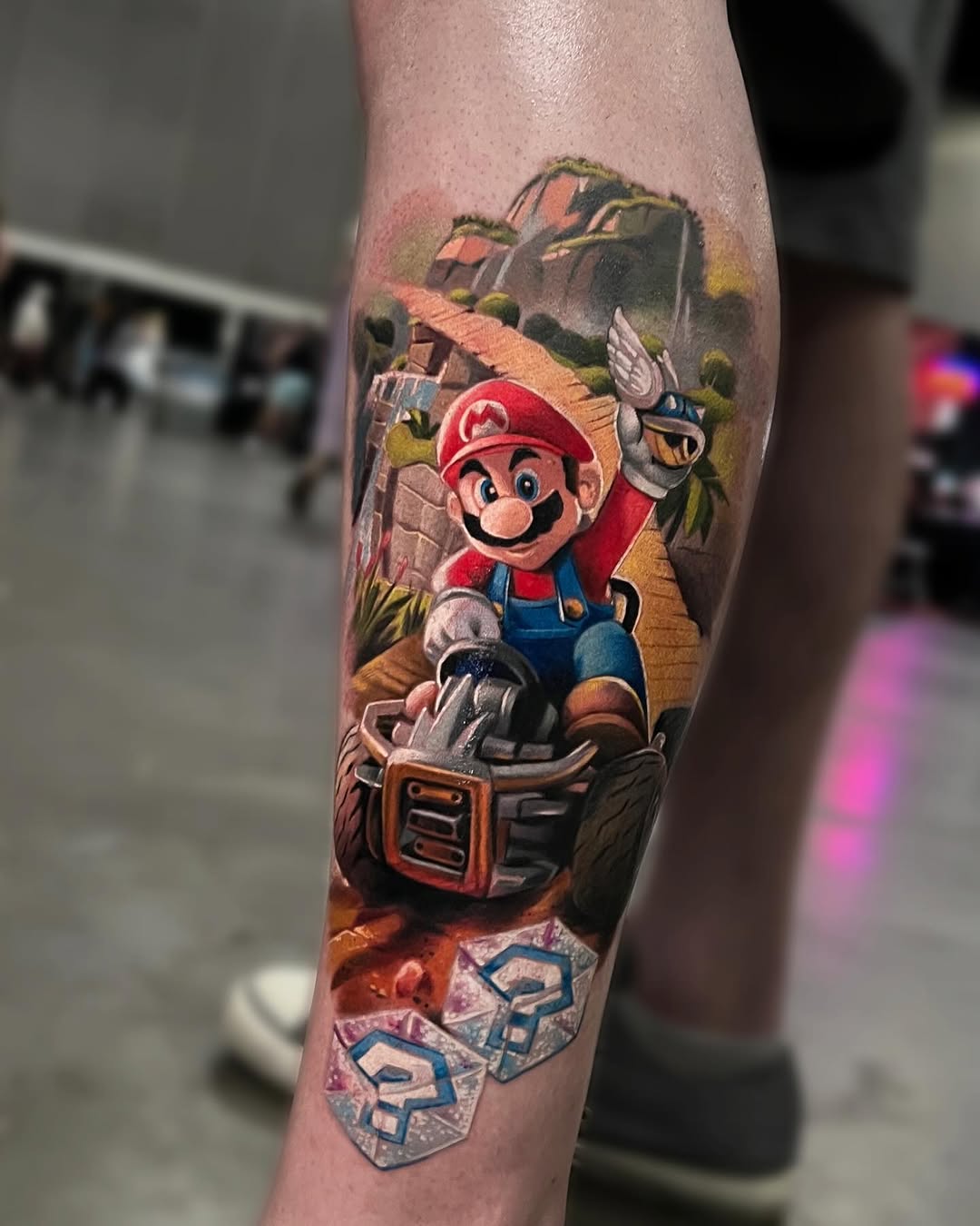 Mario Kart scene new school tattoo on the forearm by Alex Moro