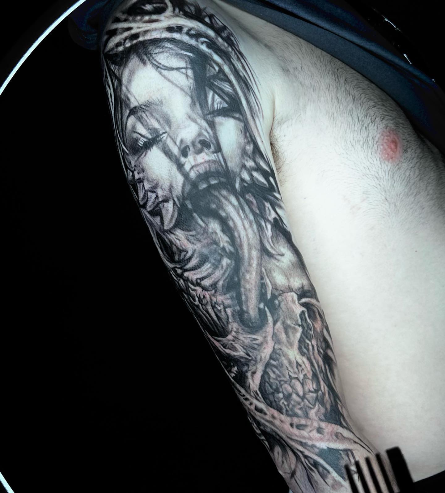 Woman with crown realism tattoo on the upper arm by Alia