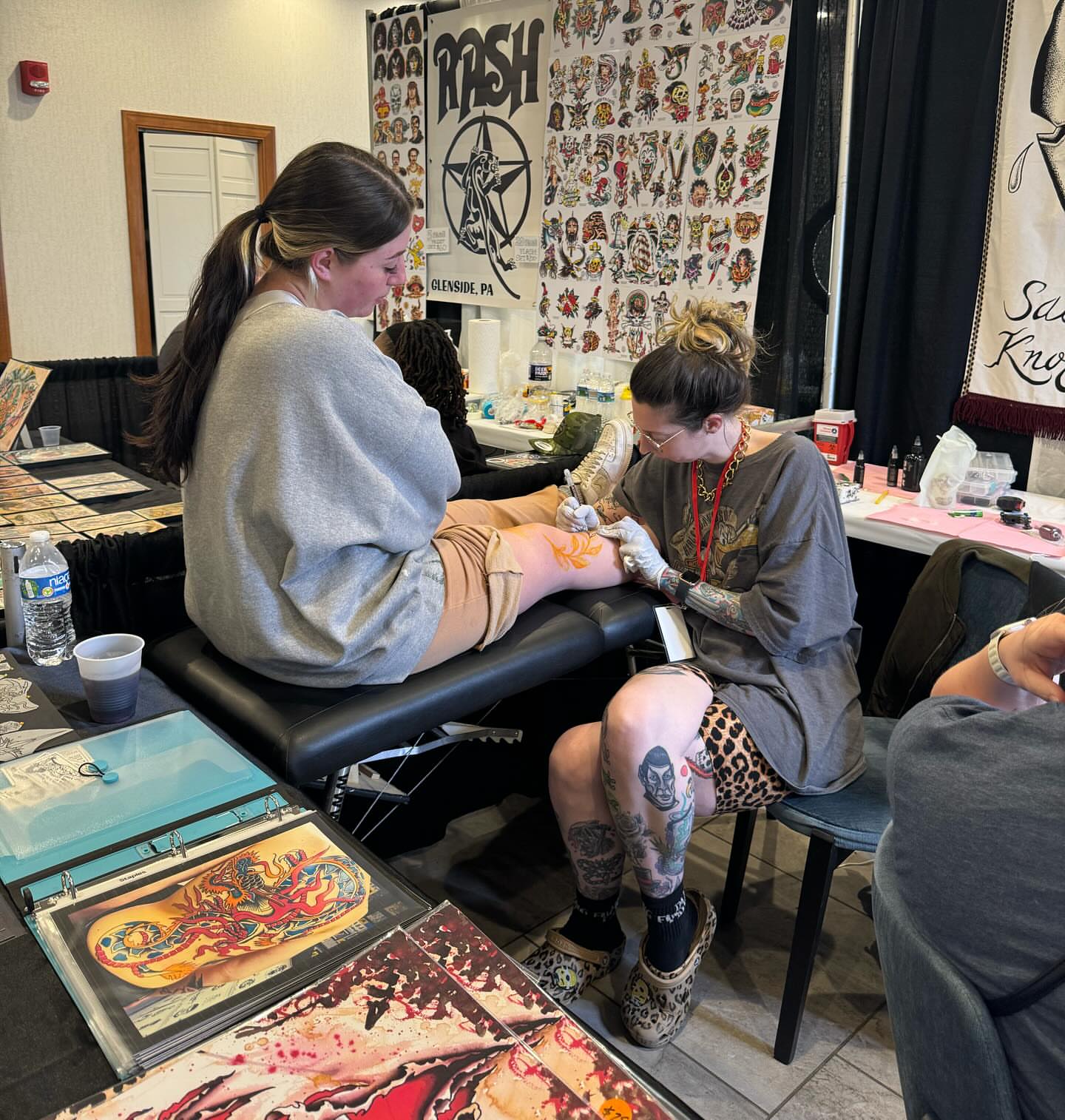 Floral design American traditional tattoo on the leg by Kimberly Shordon