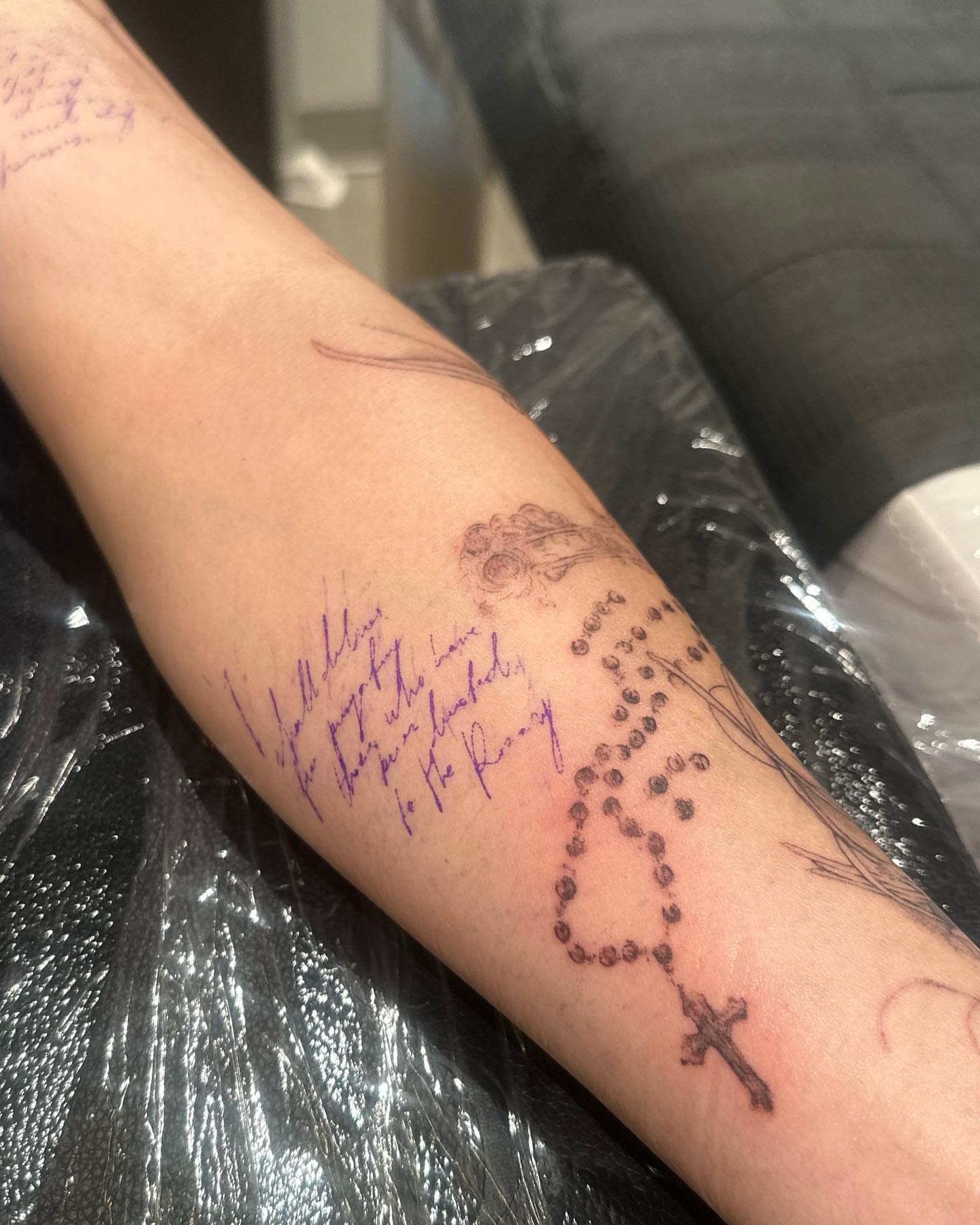 Rosary black and grey tattoo on the forearm by @taravychi