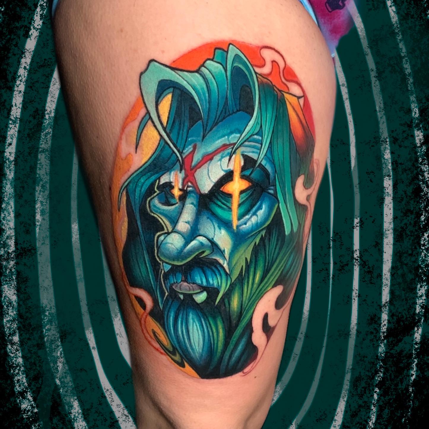 Mask illustrative tattoo on the thigh by Joshua L Wilson, Dayton, Ohio