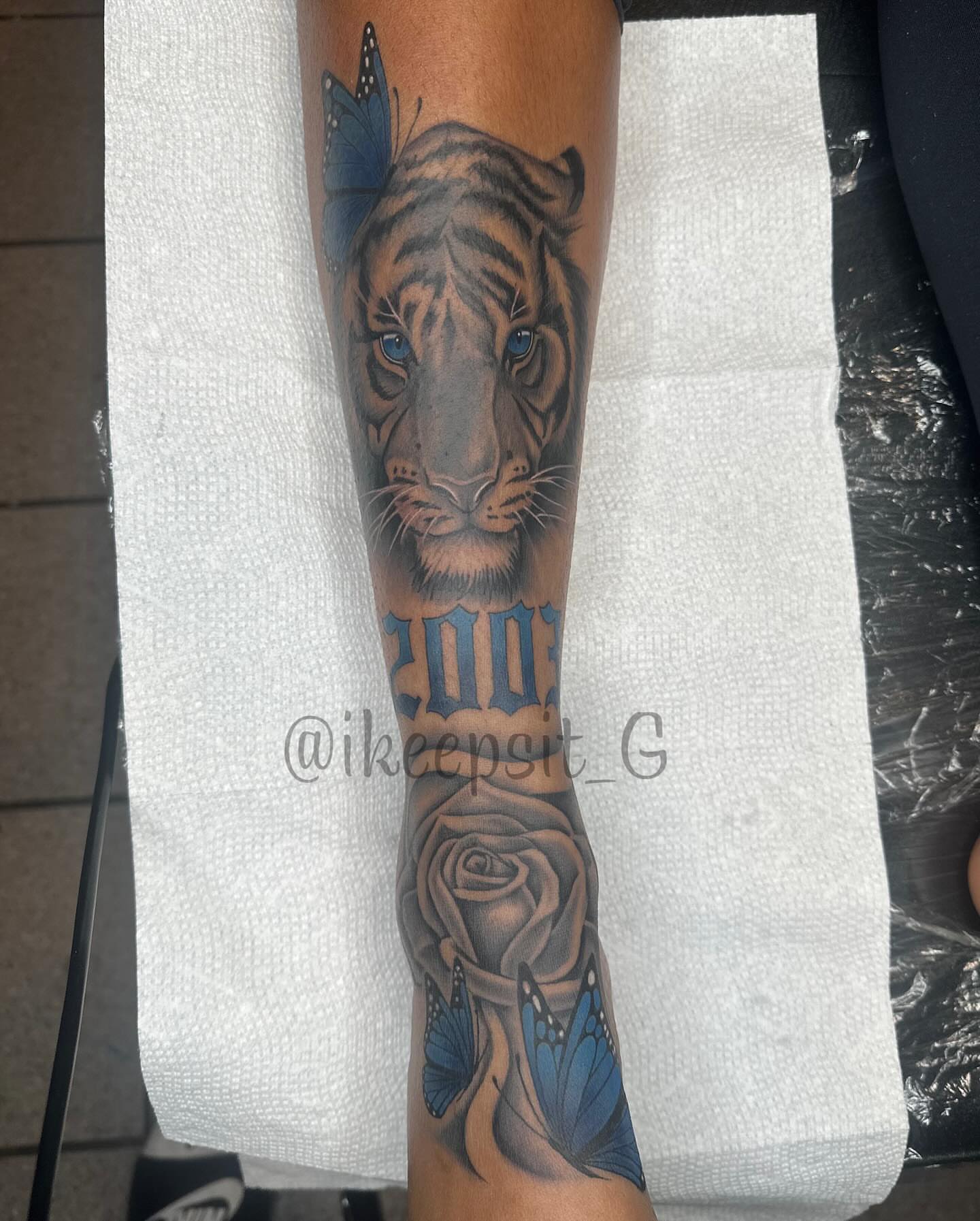 Tiger realism tattoo on the forearm by Prolific🏁so Gifted