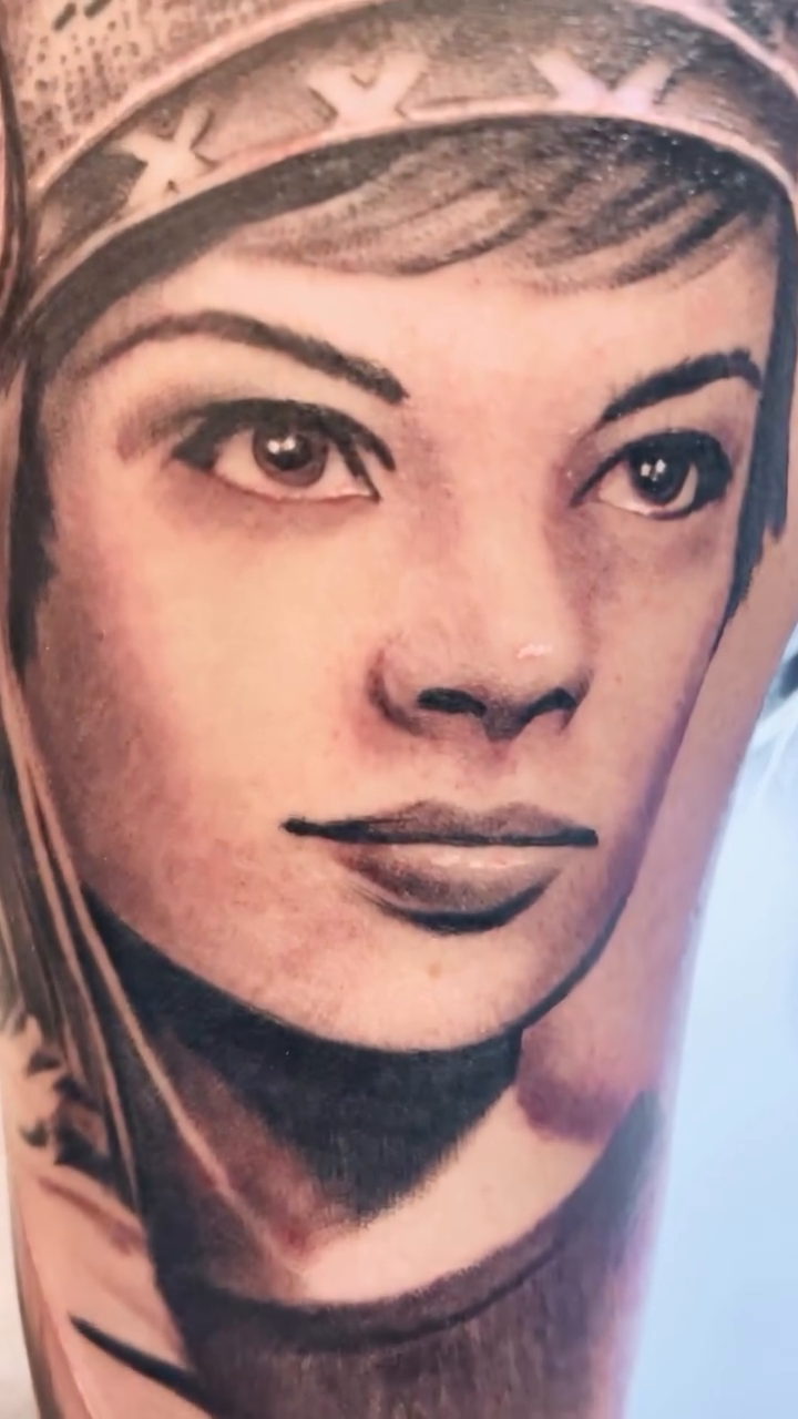 Woman in headdress realism tattoo by Brian Sixdeuce