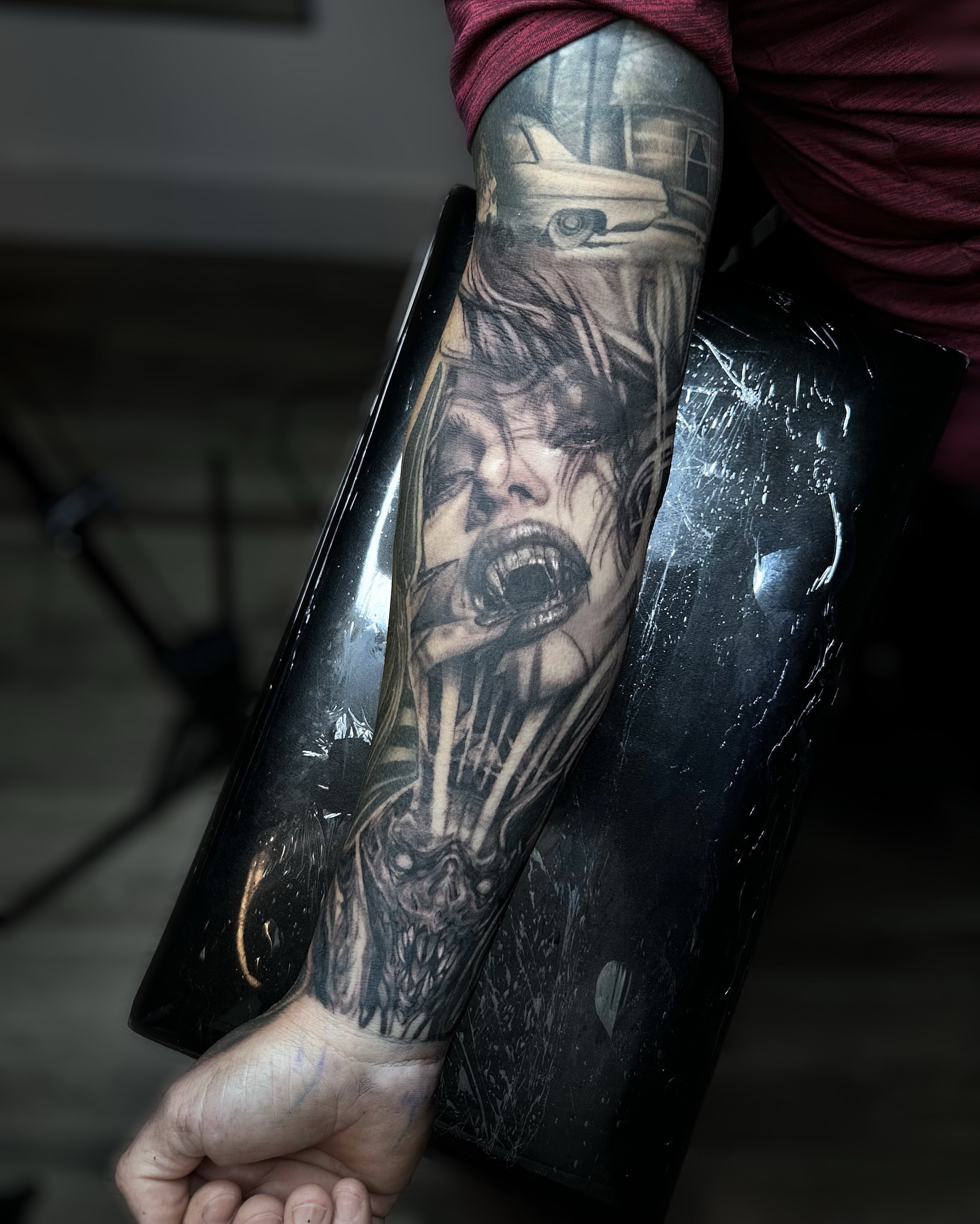 Horror scene dark realism tattoo on the forearm by Alia