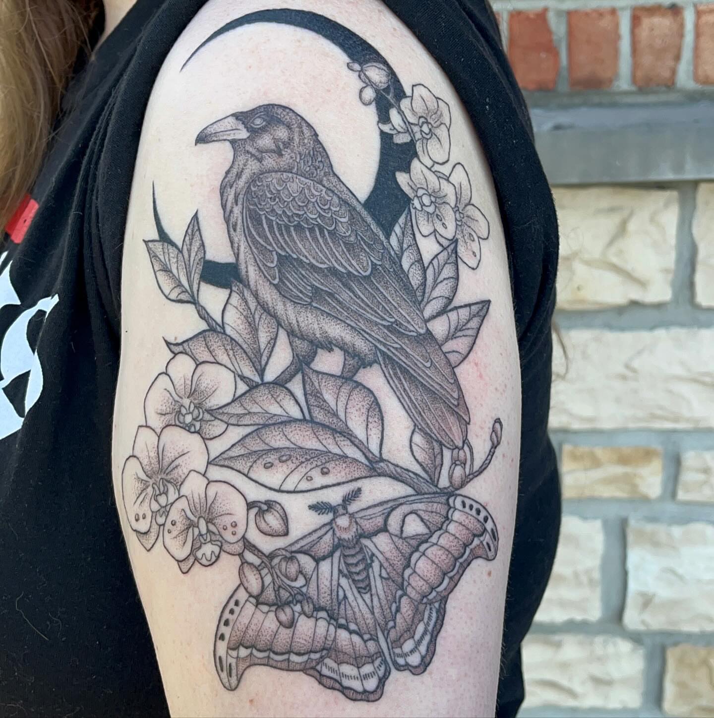 Crow and moth dotwork tattoo on the shoulder by Tina Petrullo, West Chester Township, Butler County, Ohio