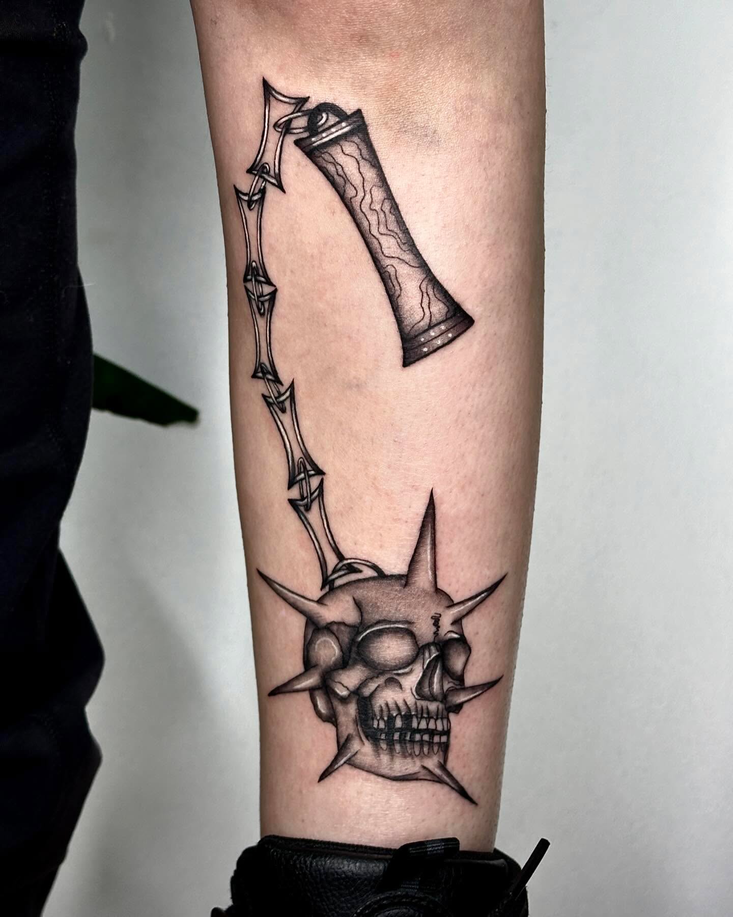 Ax and skull realism tattoo on the forearm by ✮ Monarch Tattoos ✮