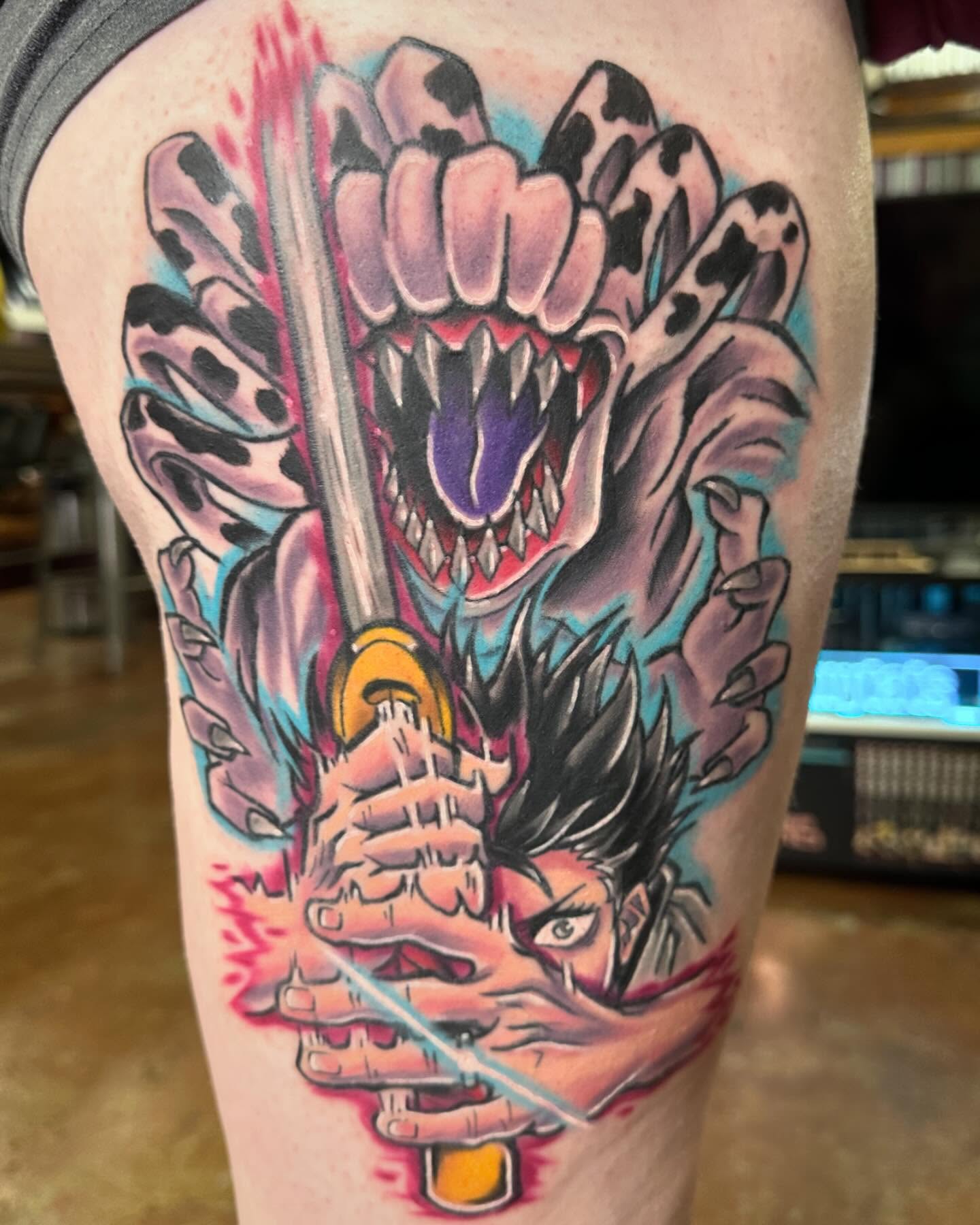 Dragon and warrior American traditional tattoo on the thigh by Jeremy Thomas