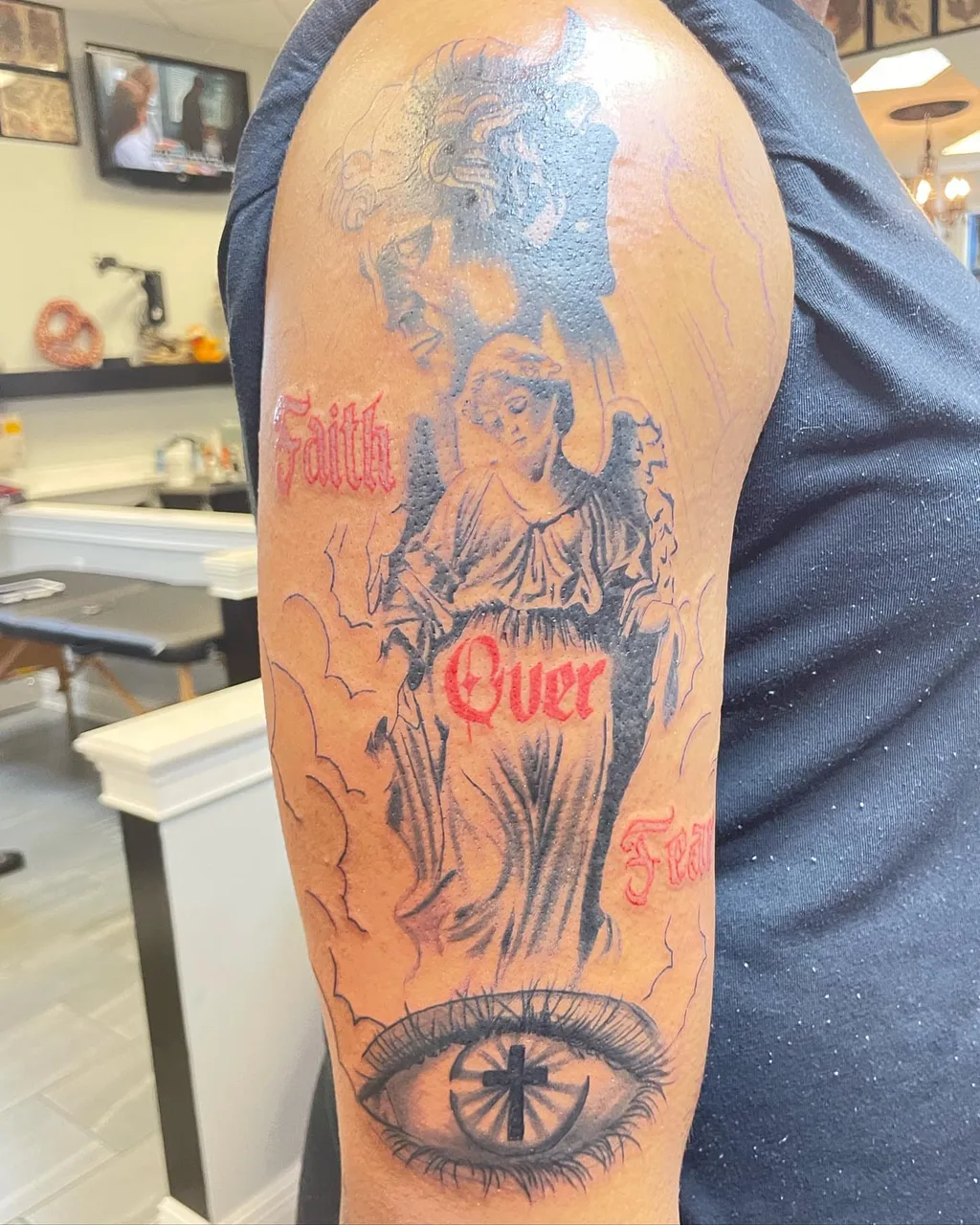 Religious figure black and grey tattoo on the forearm by lizzy, Damascus, Maryland