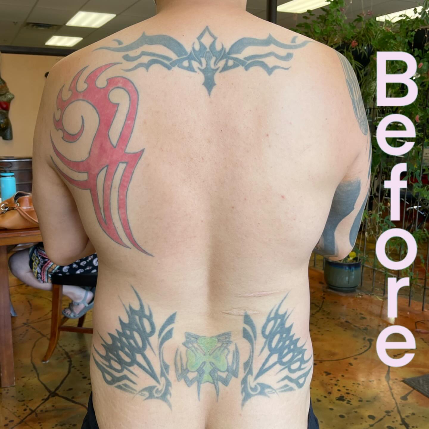 Tribal design tribal tattoo on the back by Jacoba Kaufman