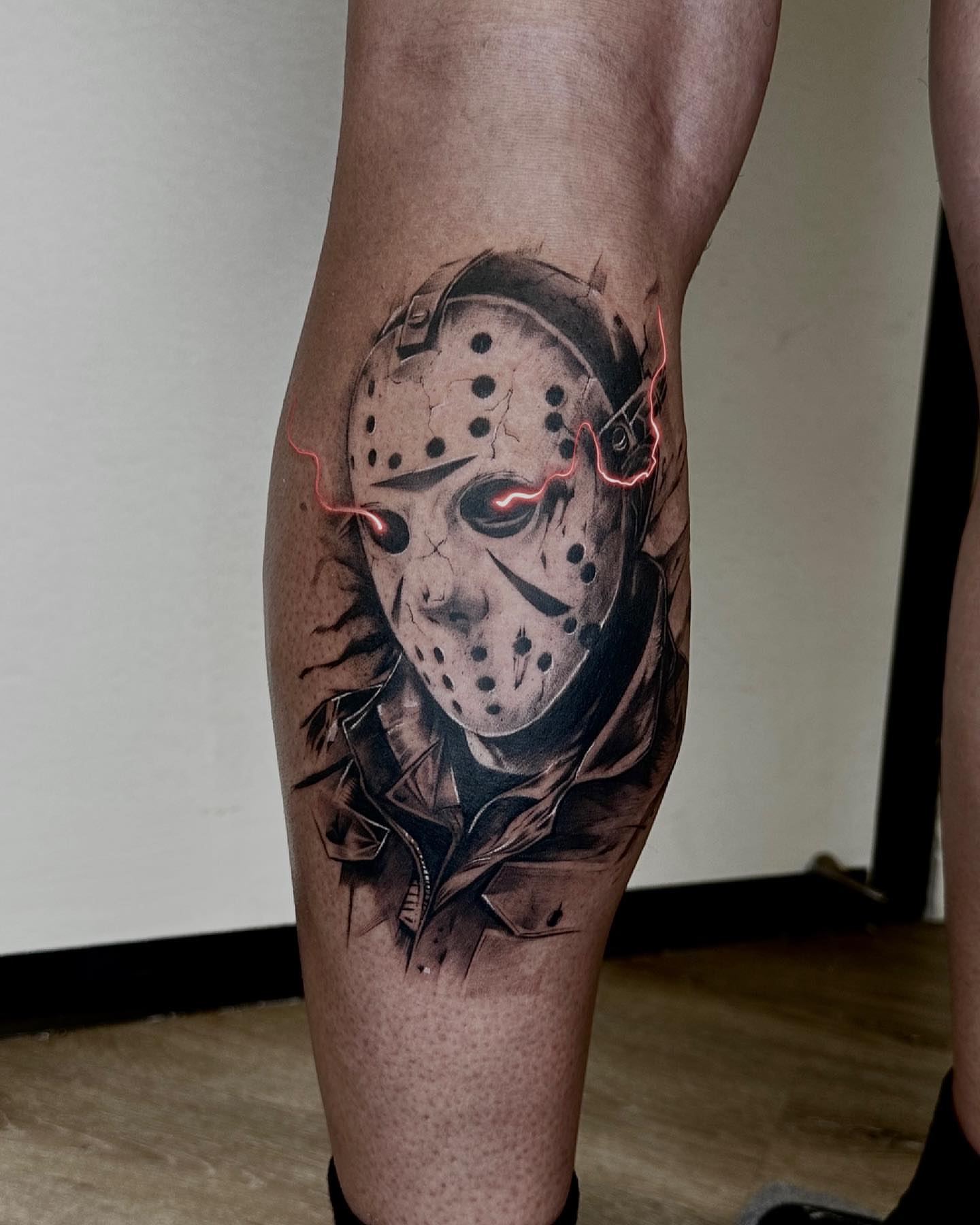 Jason voorhees mask realism tattoo on the thigh by Shihao zhao
