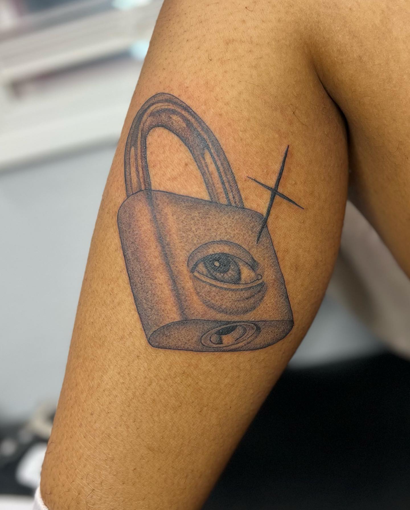 Lock with eye realism tattoo on the forearm by ✨BADJASS the tattoo artist✨