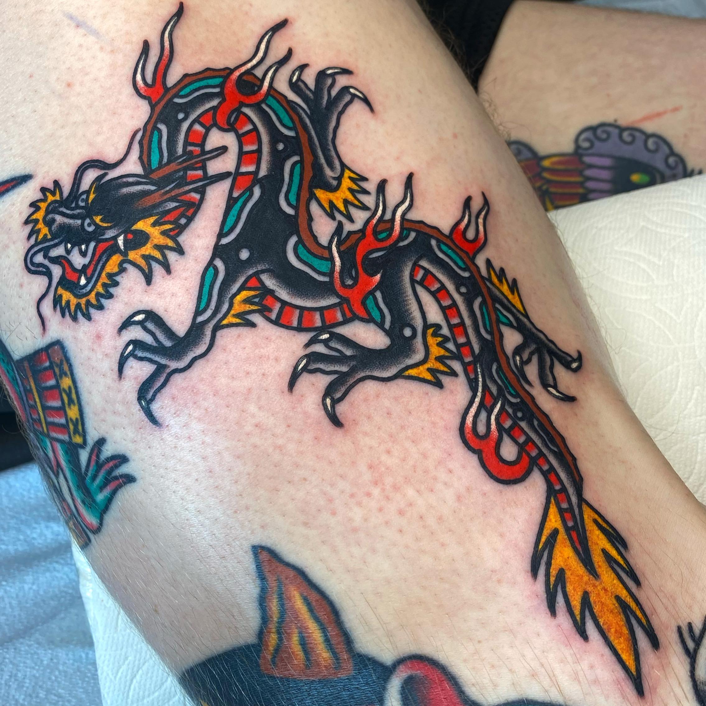 Dragon American traditional tattoo on the forearm by andrewtattoos