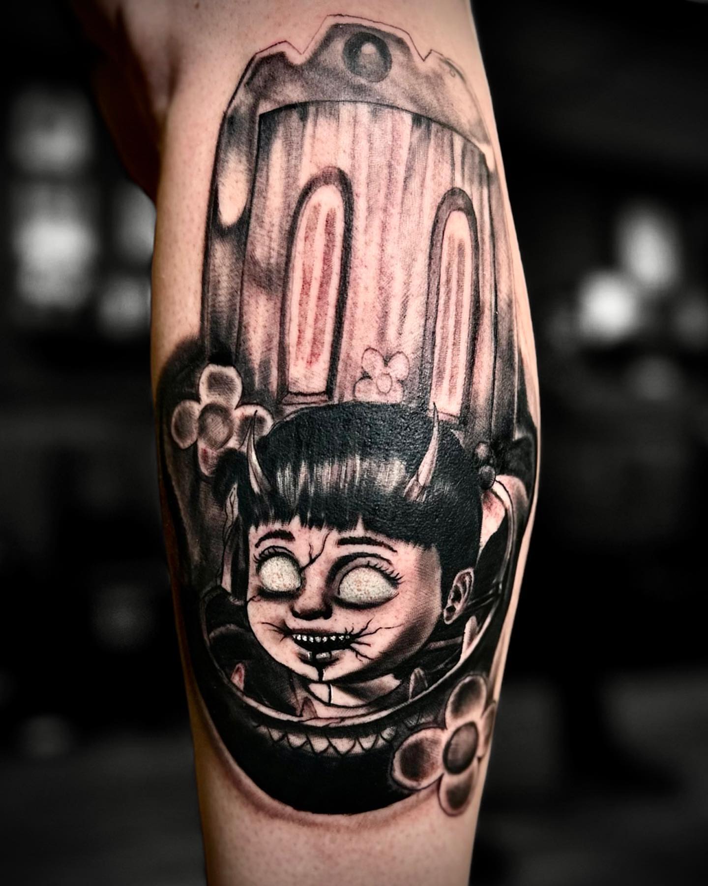 Doll head realism tattoo on the forearm by Tattoo Artist Ian Day (Everlasting_Art_Ink)