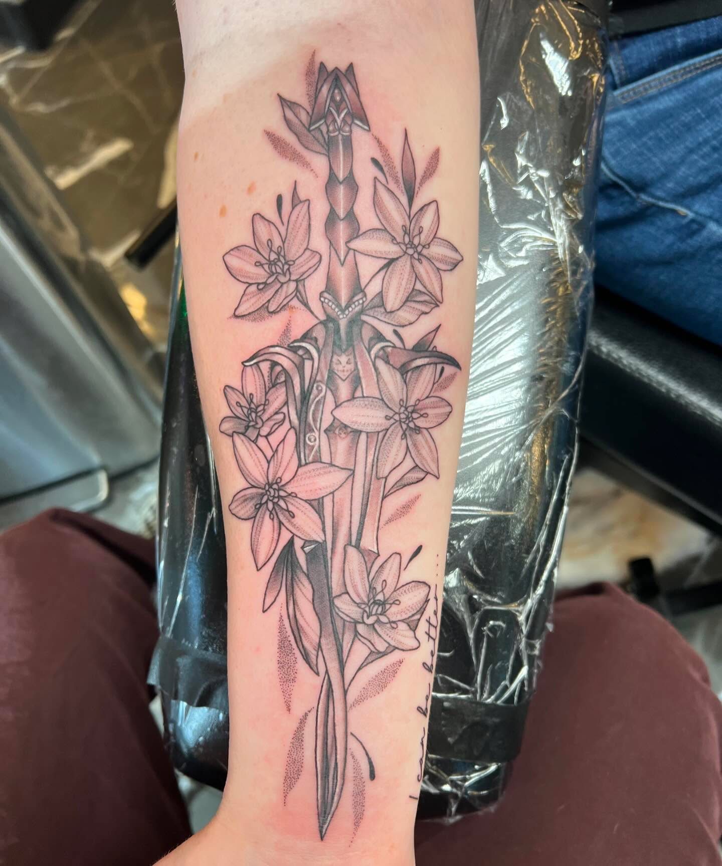 Lilies dotwork tattoo on the forearm by Brooke, Kansas City, Missouri