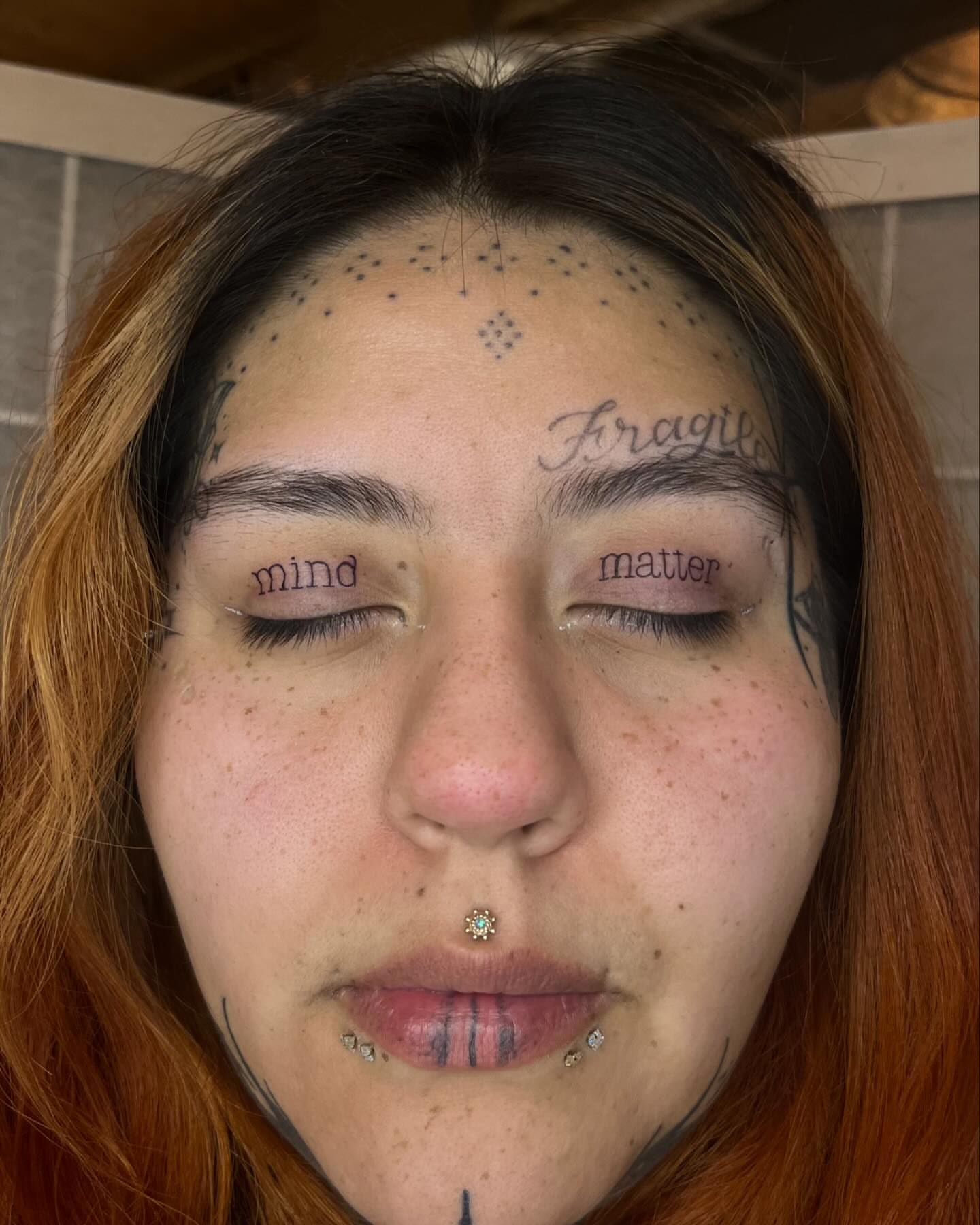 Face dotwork tattoo by Taylor Newton