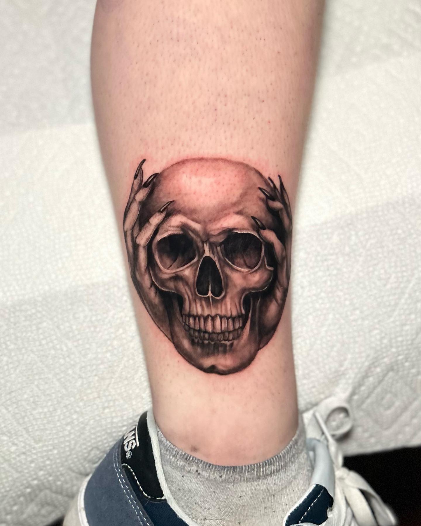 Skull realism tattoo on the forearm by Tiffany Bauer
