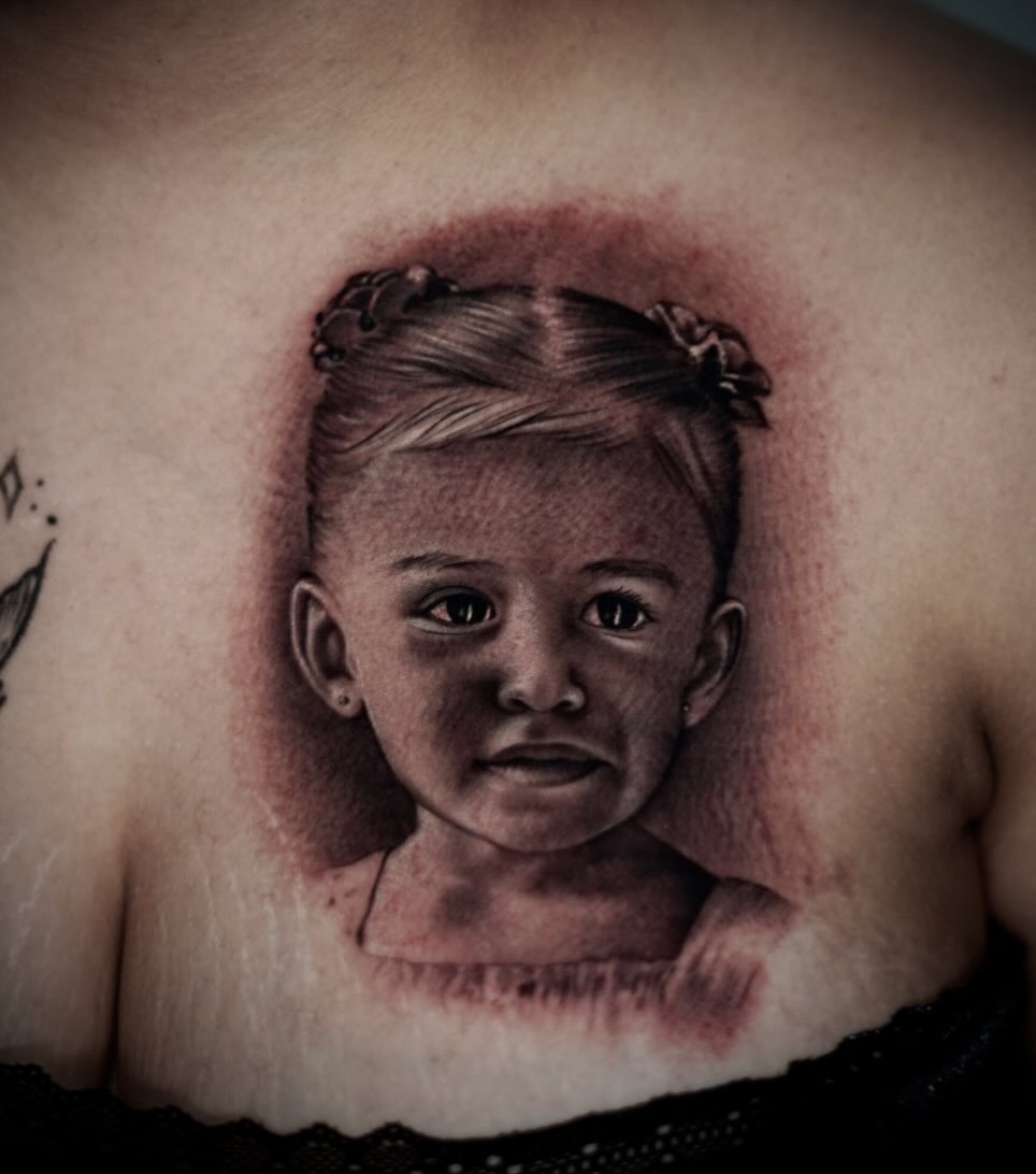 Child portrait realism tattoo on the back by DREW ROMERO - Colorado Tattoo Artist, Pueblo, Colorado
