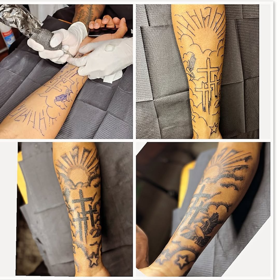 Crosses, sun, clouds, dove, and stars Chicano tattoo on the forearm by CmoreInk