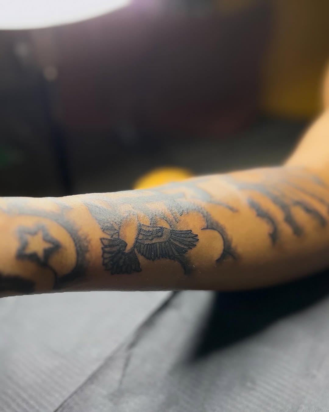 Eagle and clouds realism tattoo on the forearm by CmoreInk