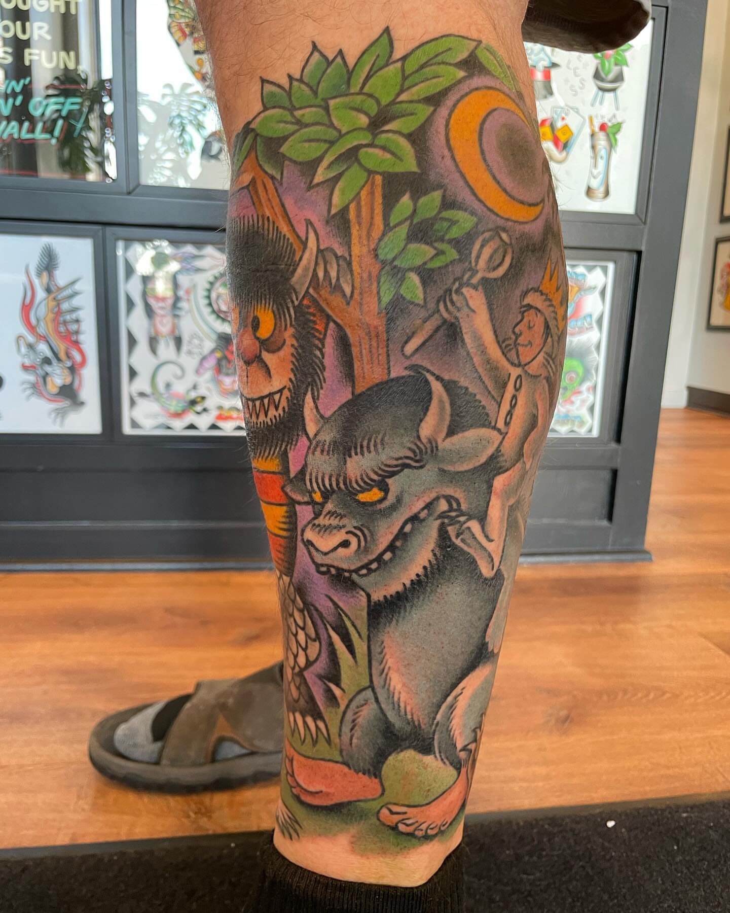 Bull and demon American traditional tattoo on the calf by Grandma Approved, Chicago, Illinois