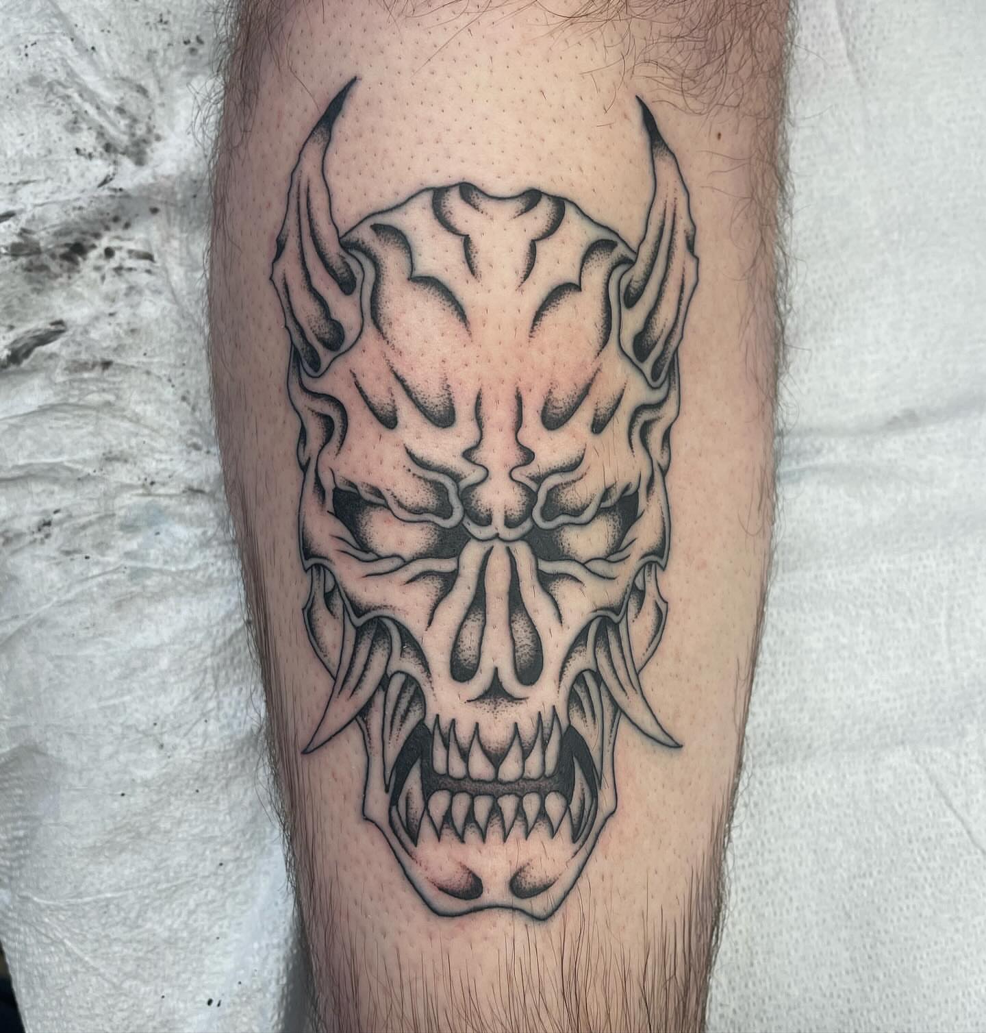 Demon skull dark realism tattoo on the forearm by Brayden P Tattoo