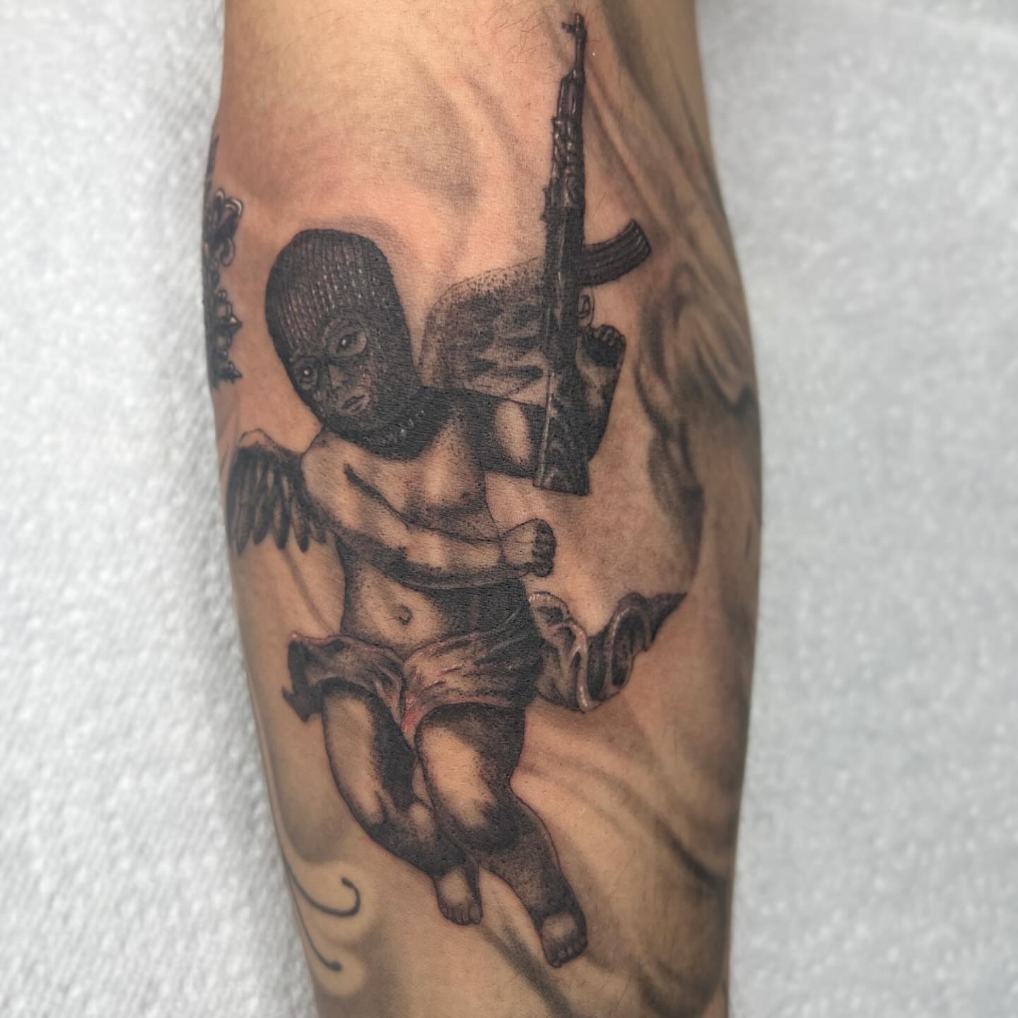 Tattoo by @na_tattoos — black_and_grey