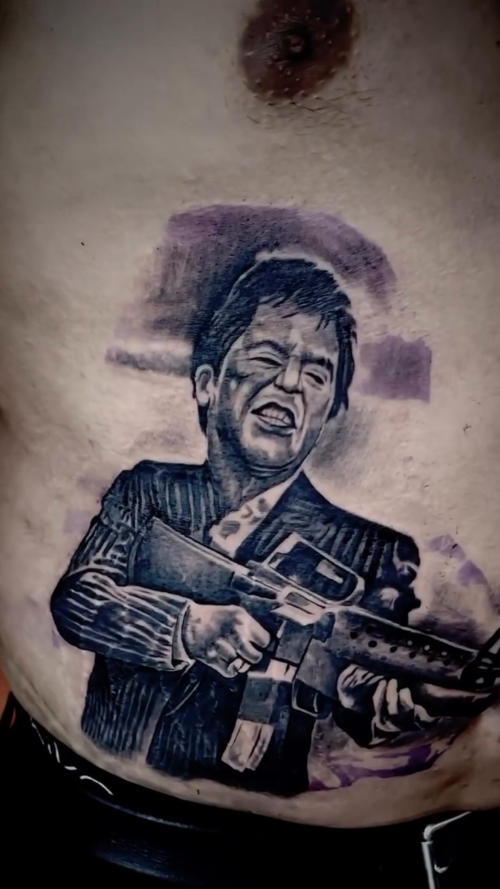 Tony Montana with a gun realism tattoo by Sacramento Tattoo Artist Ryan