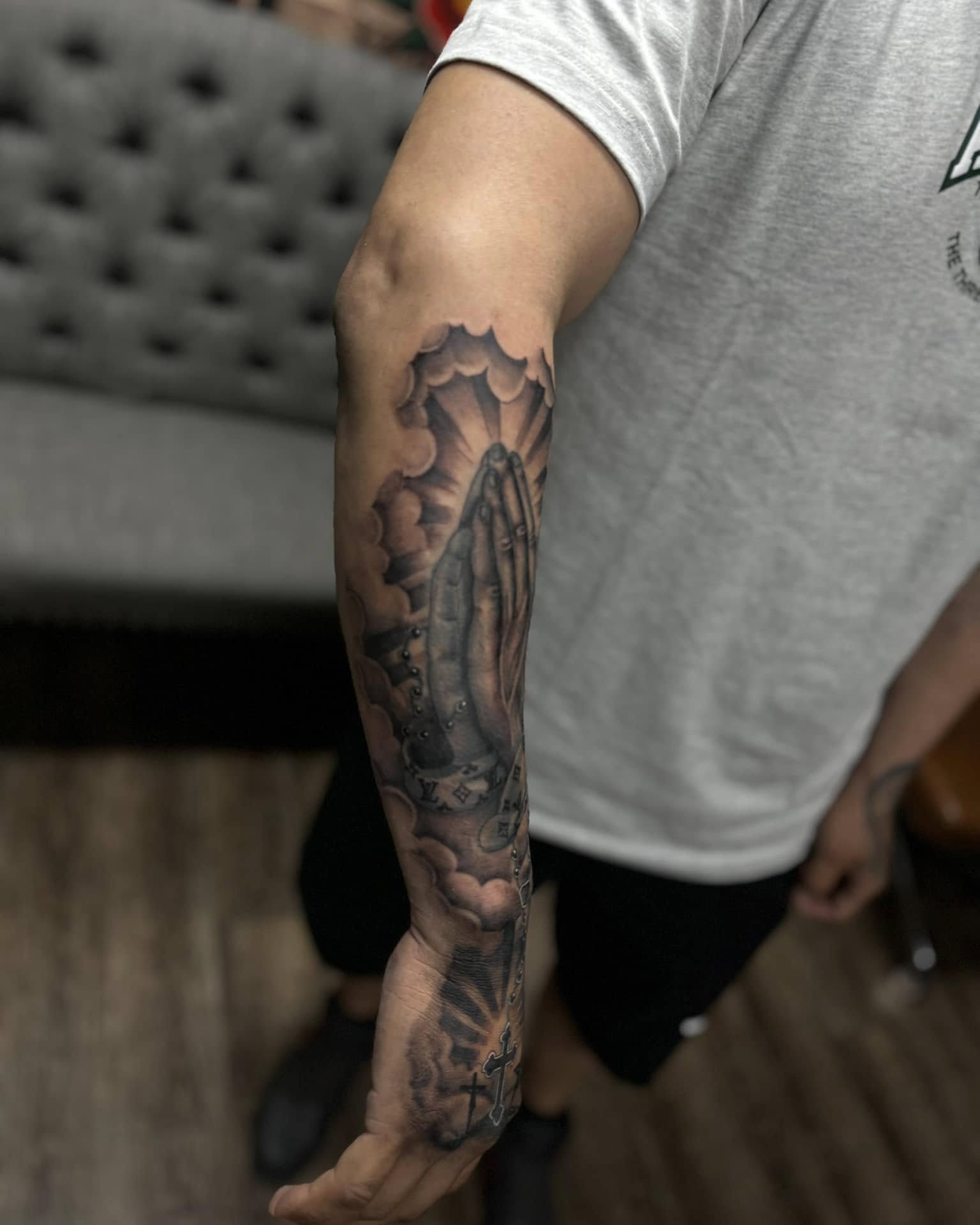 Praying hands realism tattoo on the forearm by Chris_Tatt2_D’Ascenzo