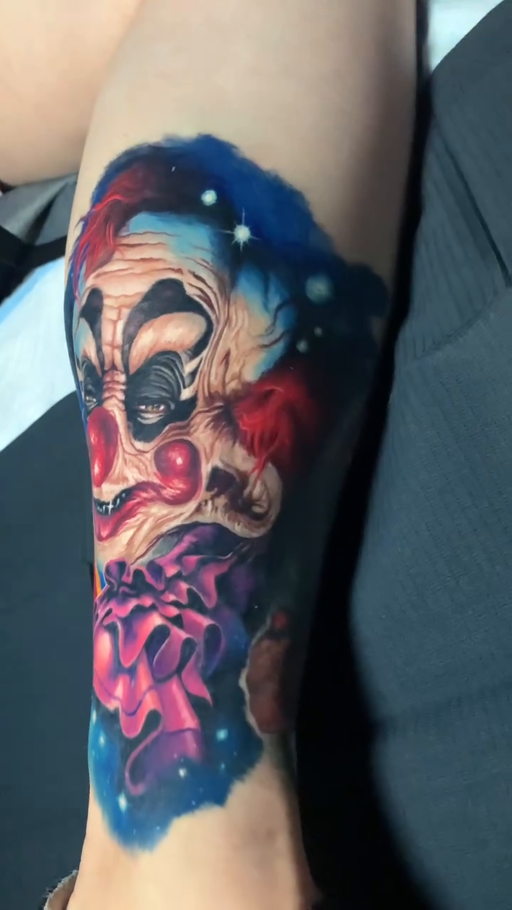 Clown and cosmic background new school tattoo by 🦇𝖀𝖙𝖆𝖍🦇, Las Vegas, Nevada