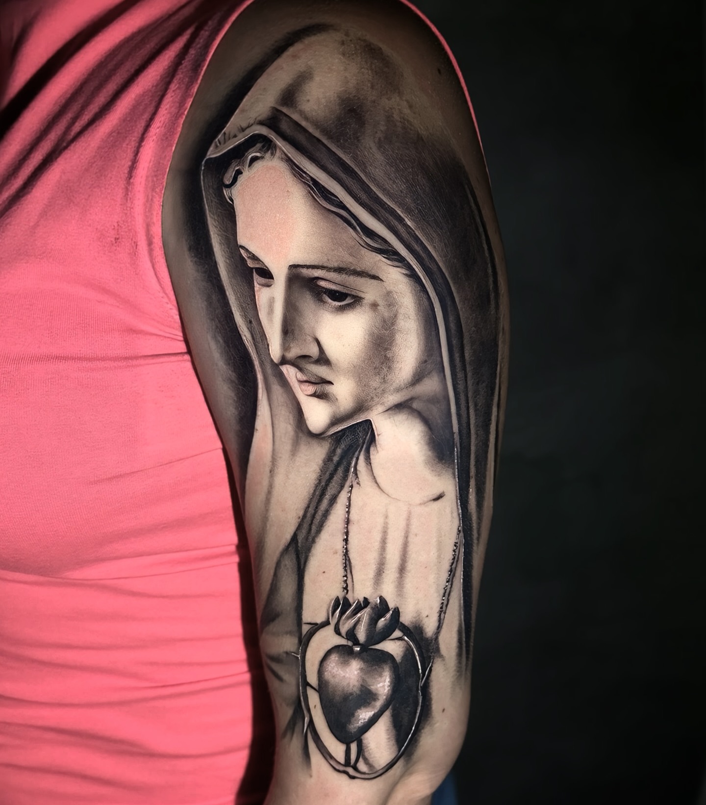 Religious figure realism tattoo on the forearm by Tattoo Artist - the Goat