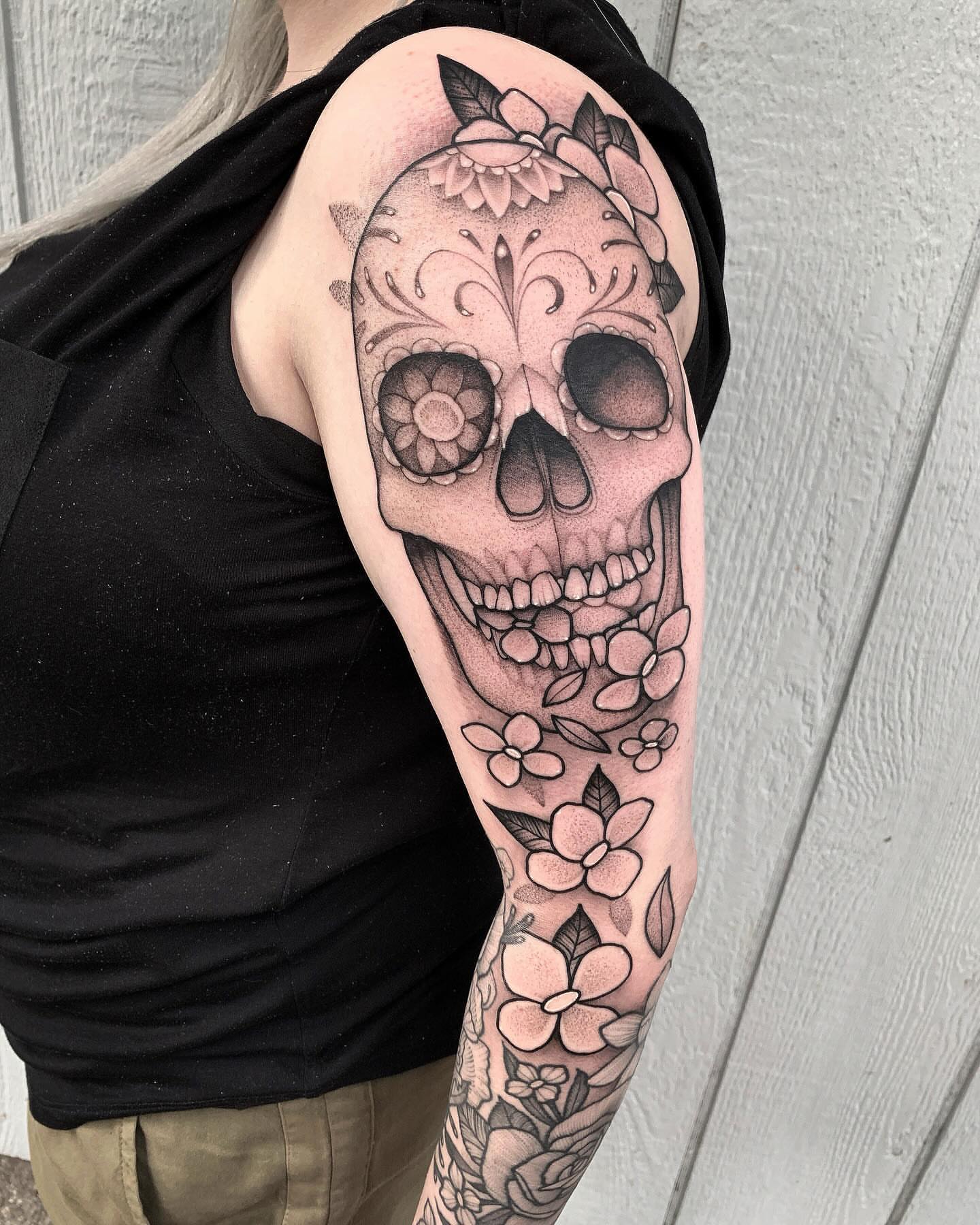 Sugar skull black and grey tattoo on the forearm by Lawrence Edwards