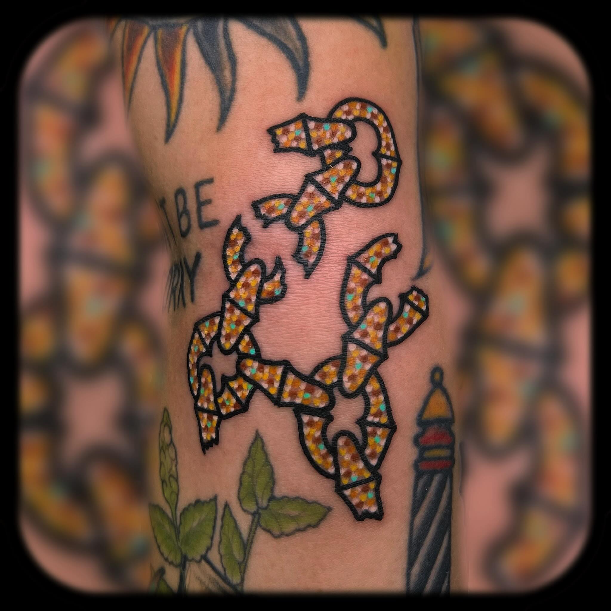 Chain link dotwork tattoo on the forearm by Benjamin Ward